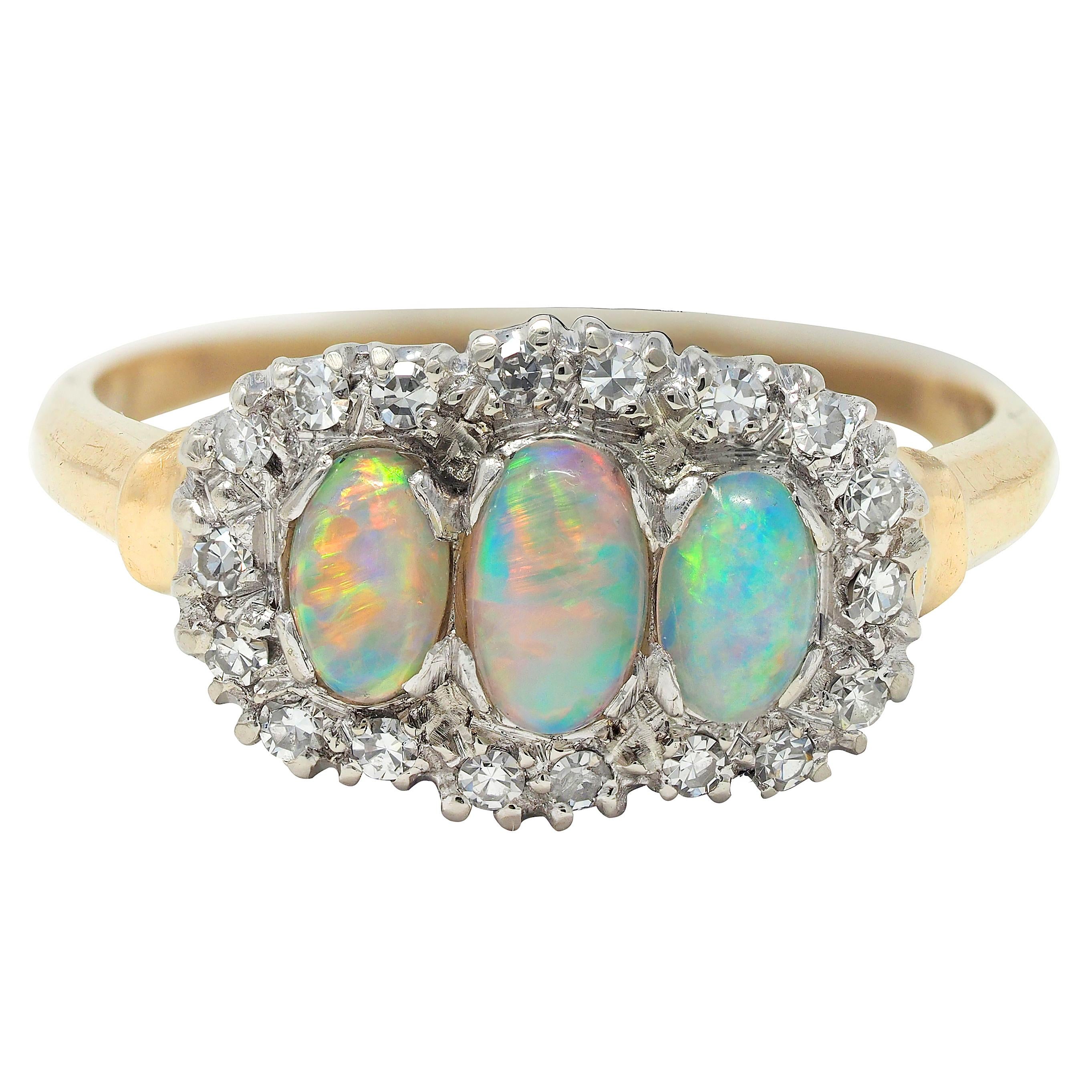 1950's Opal Cabochon Diamond 14 Karat Two-Tone Gold Vintage Halo Ring