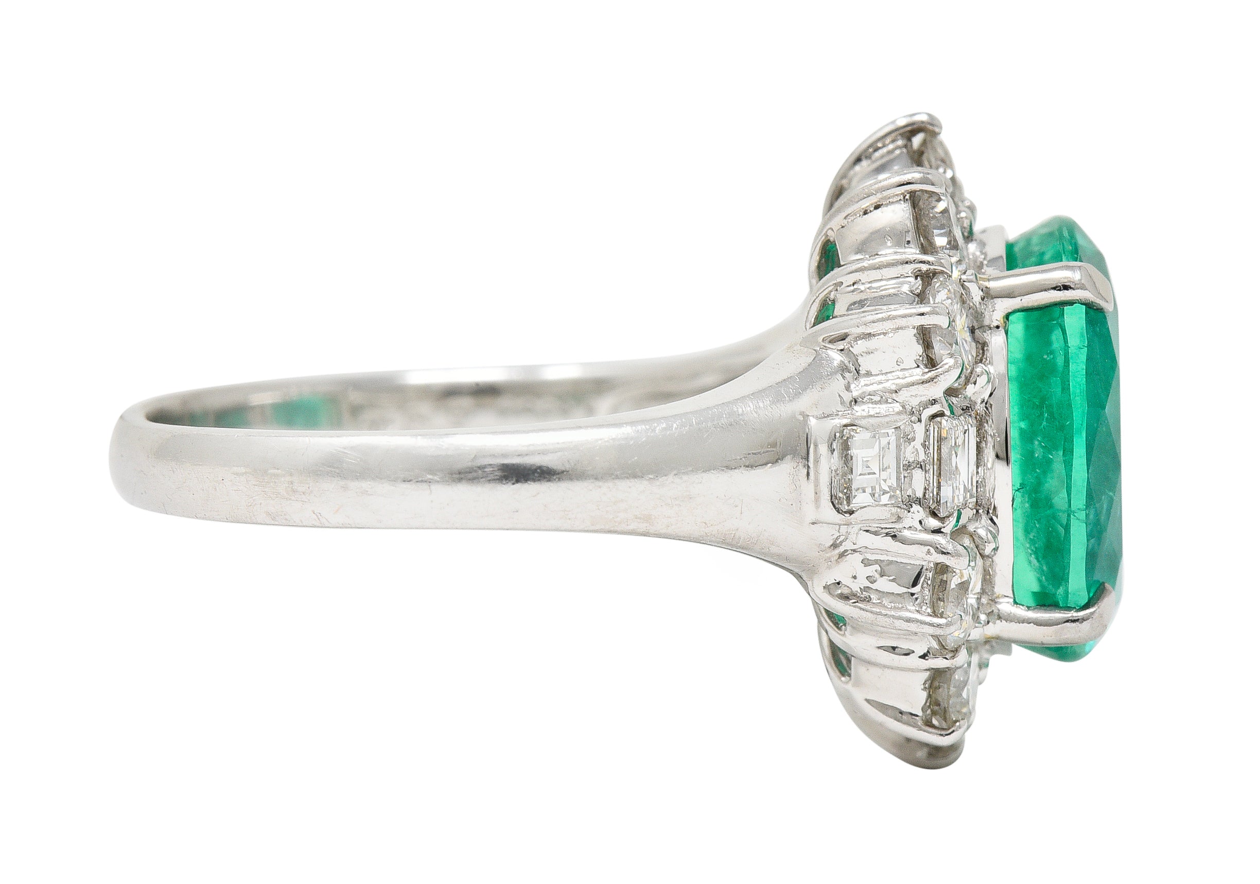 Contemporary 6.77 CTW Columbian Emerald Diamond Platinum Halo Ring GIA Wilson's Estate Jewelry