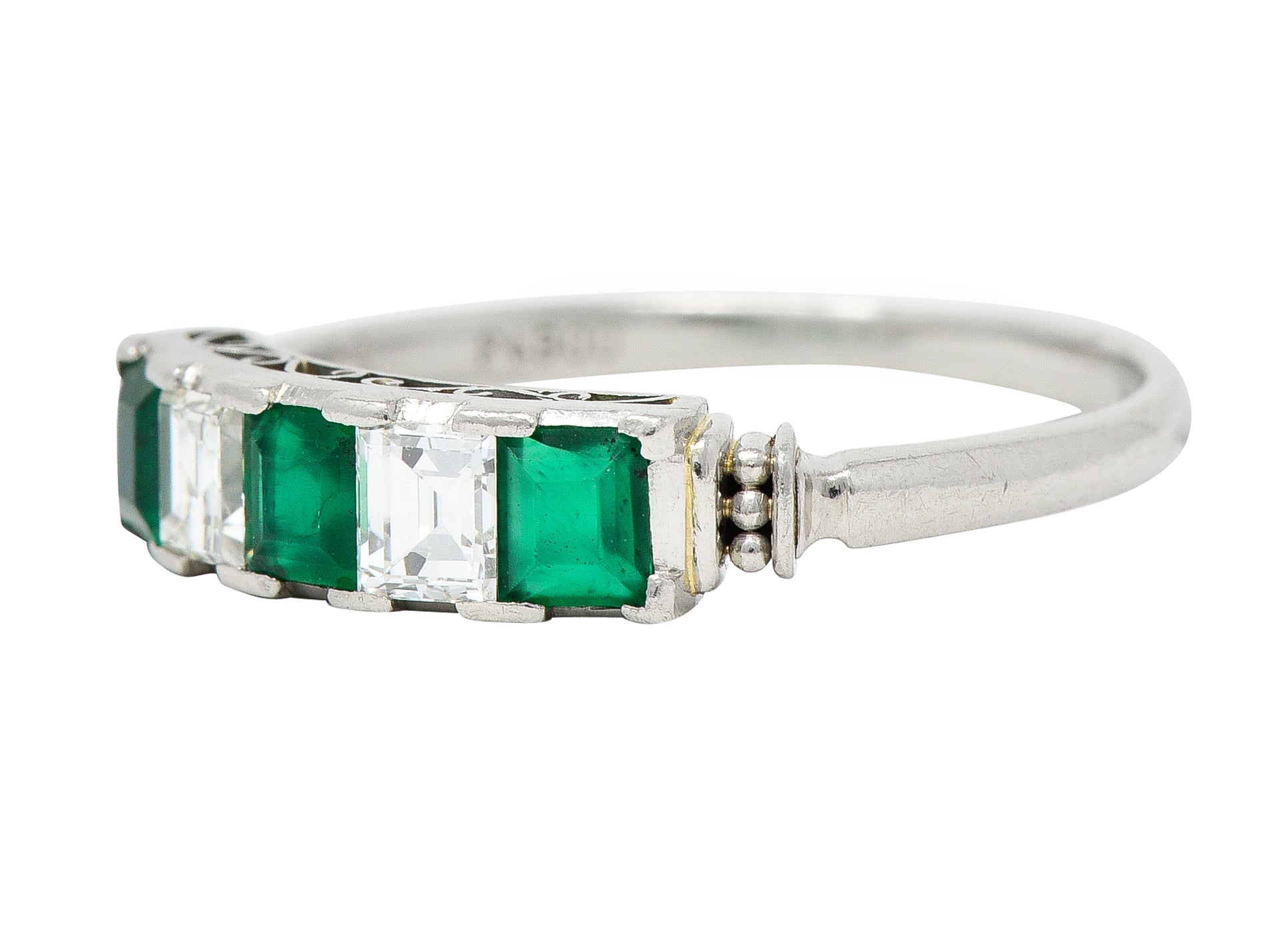 Contemporary 0.97 CTW Emerald Diamond Platinum Scrolling Band Ring Wilson's Estate Jewelry