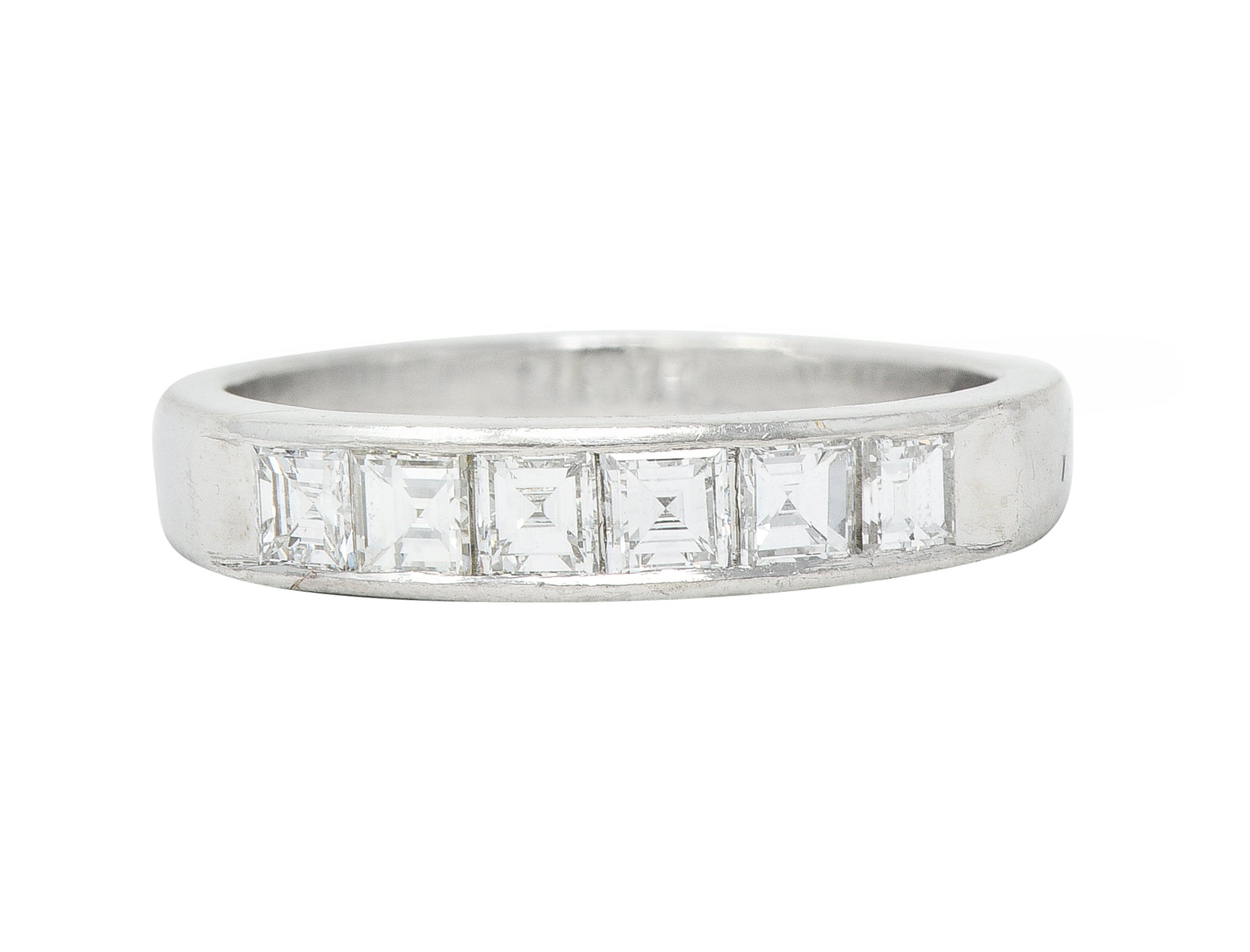 Contemporary 0.72 CTW Square Step Cut Diamond Platinum Five Stone Channel Band Ring Wilson's Estate Jewelry