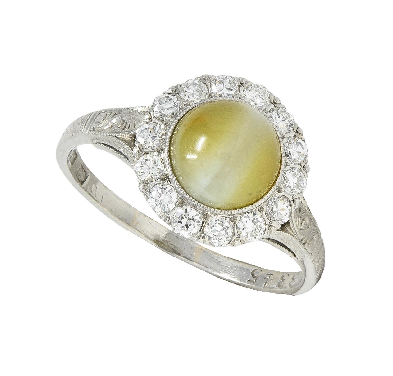 Late Art Deco 0.42 CTW Diamond Cat's Eye Chrysoberyl Platinum Vintage Halo Ring