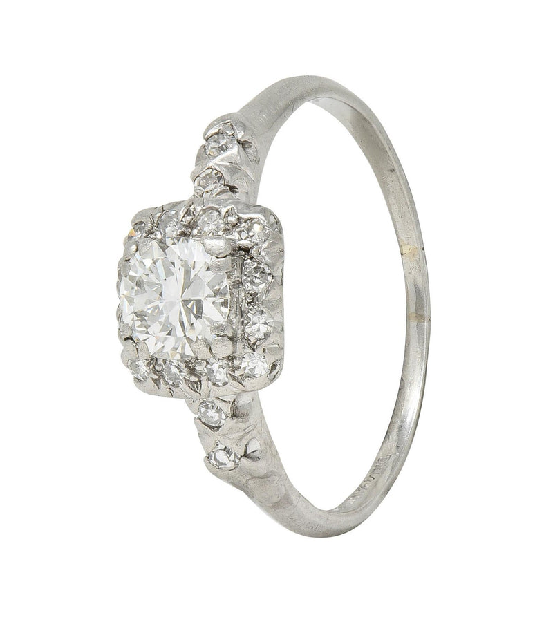 Mid-Century 0.62 CTW Diamond Platinum Halo Vintage Engagement Ring