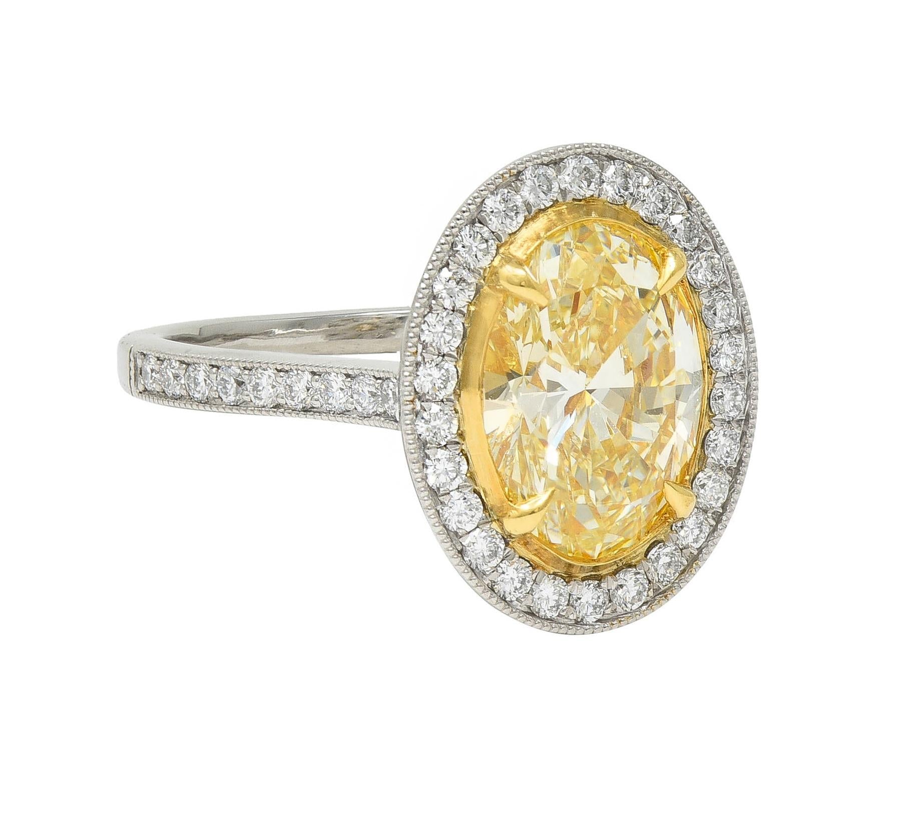 Contemporary 2.72 CTW Yellow Diamond Platinum 18 Karat Gold Halo Ring GIA