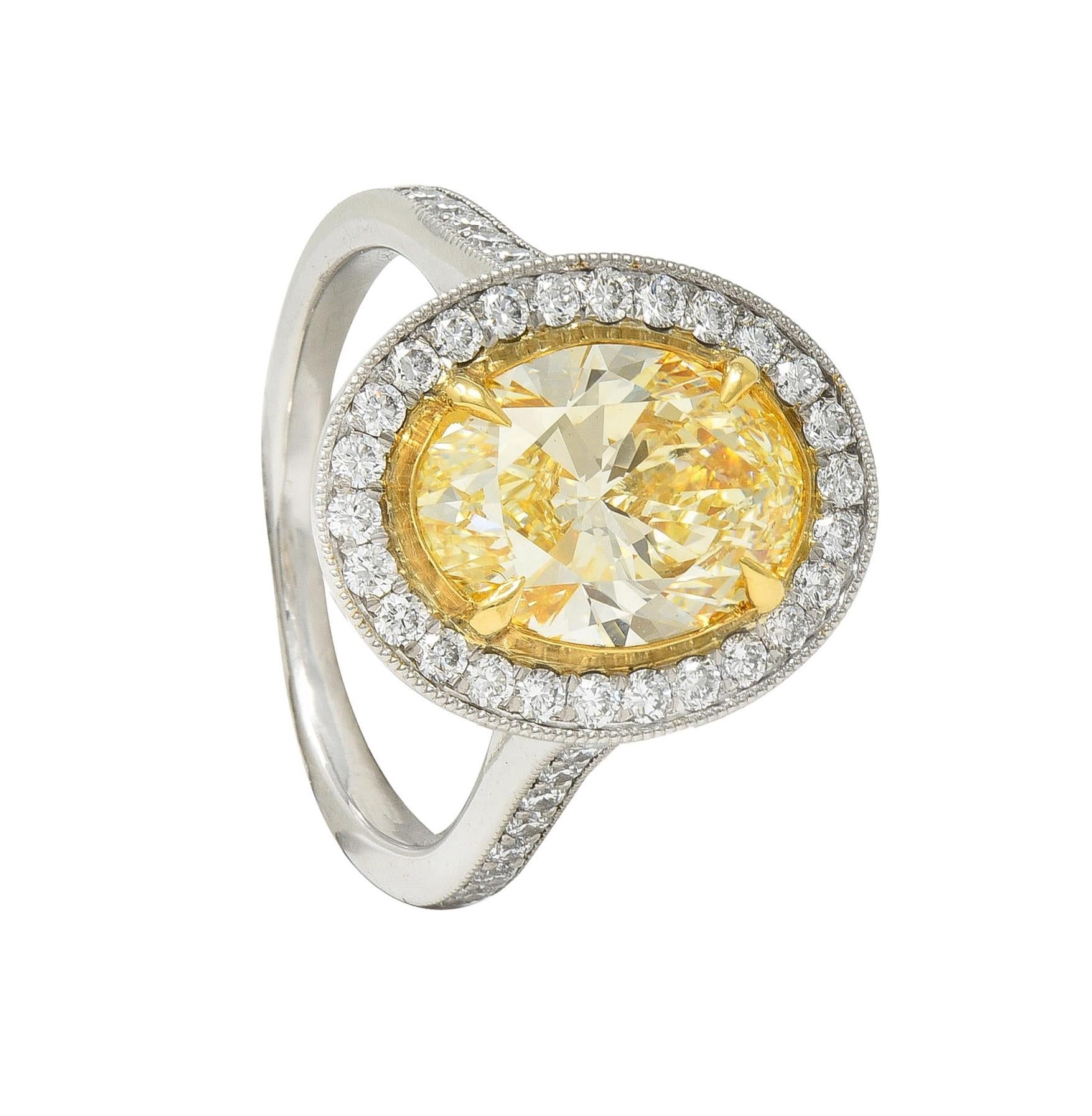 Contemporary 2.72 CTW Yellow Diamond Platinum 18 Karat Gold Halo Ring GIA