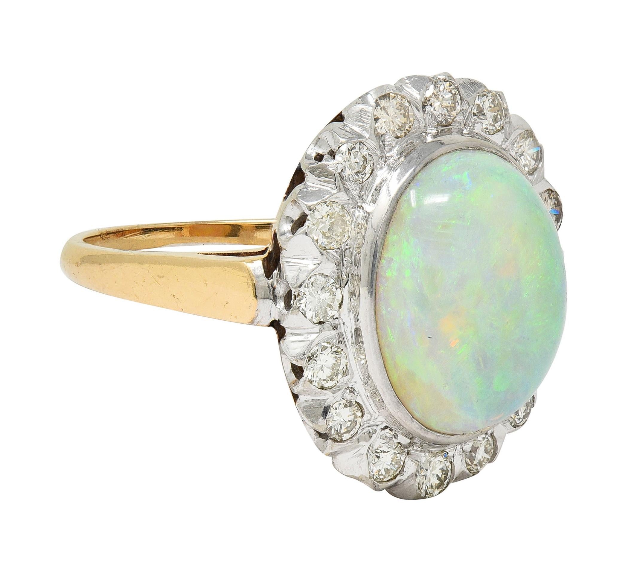 1940's Opal Diamond 14 Karat Two-Tone Gold Vintage Halo Ring