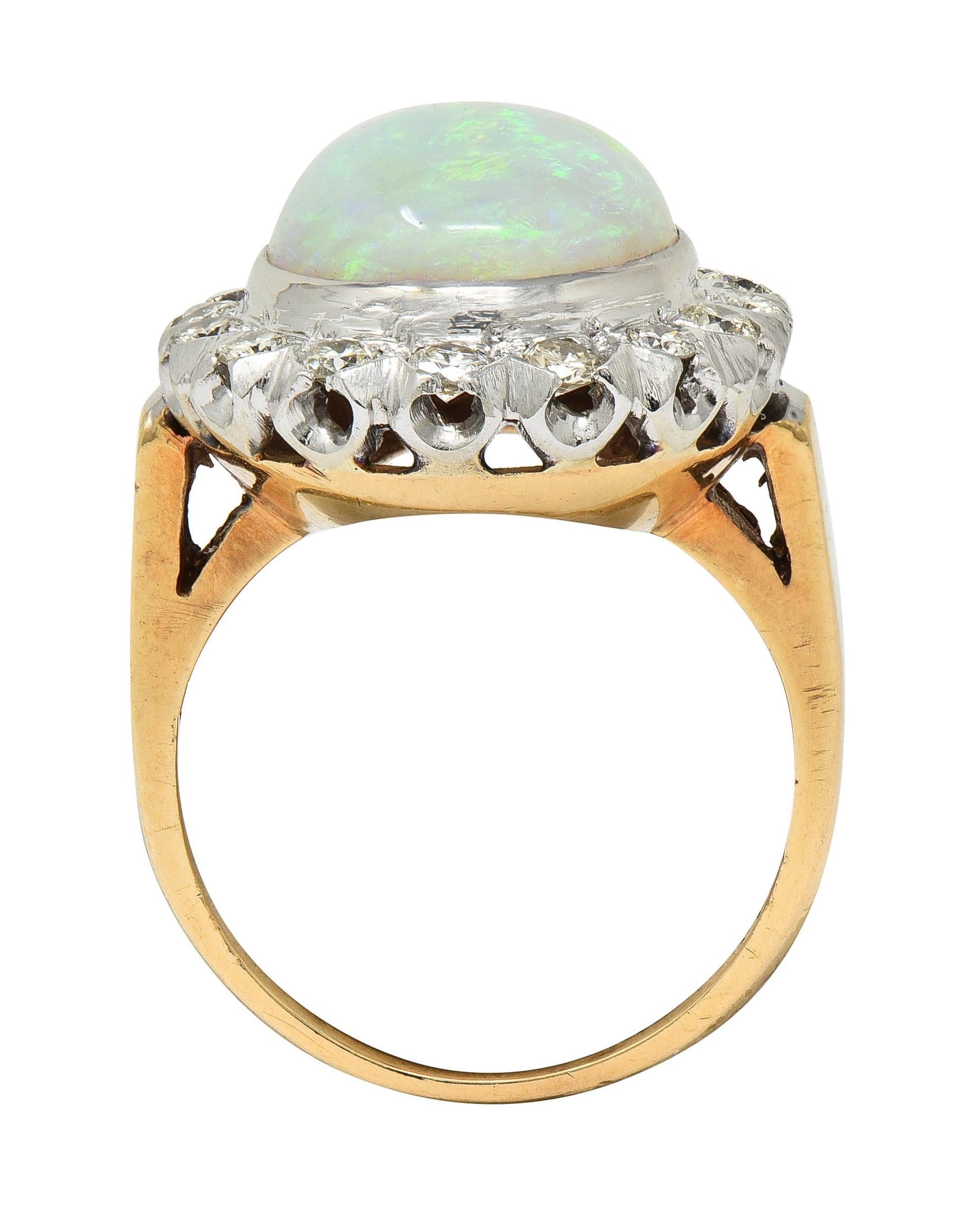 1940's Opal Diamond 14 Karat Two-Tone Gold Vintage Halo Ring