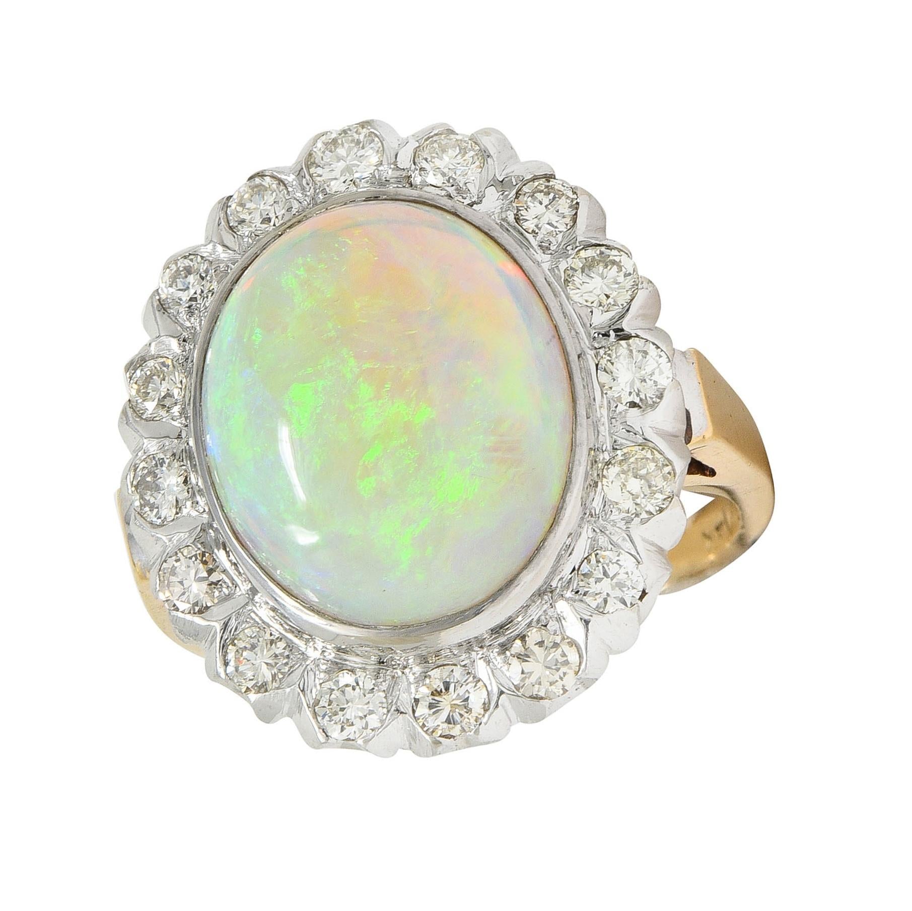 1940's Opal Diamond 14 Karat Two-Tone Gold Vintage Halo Ring