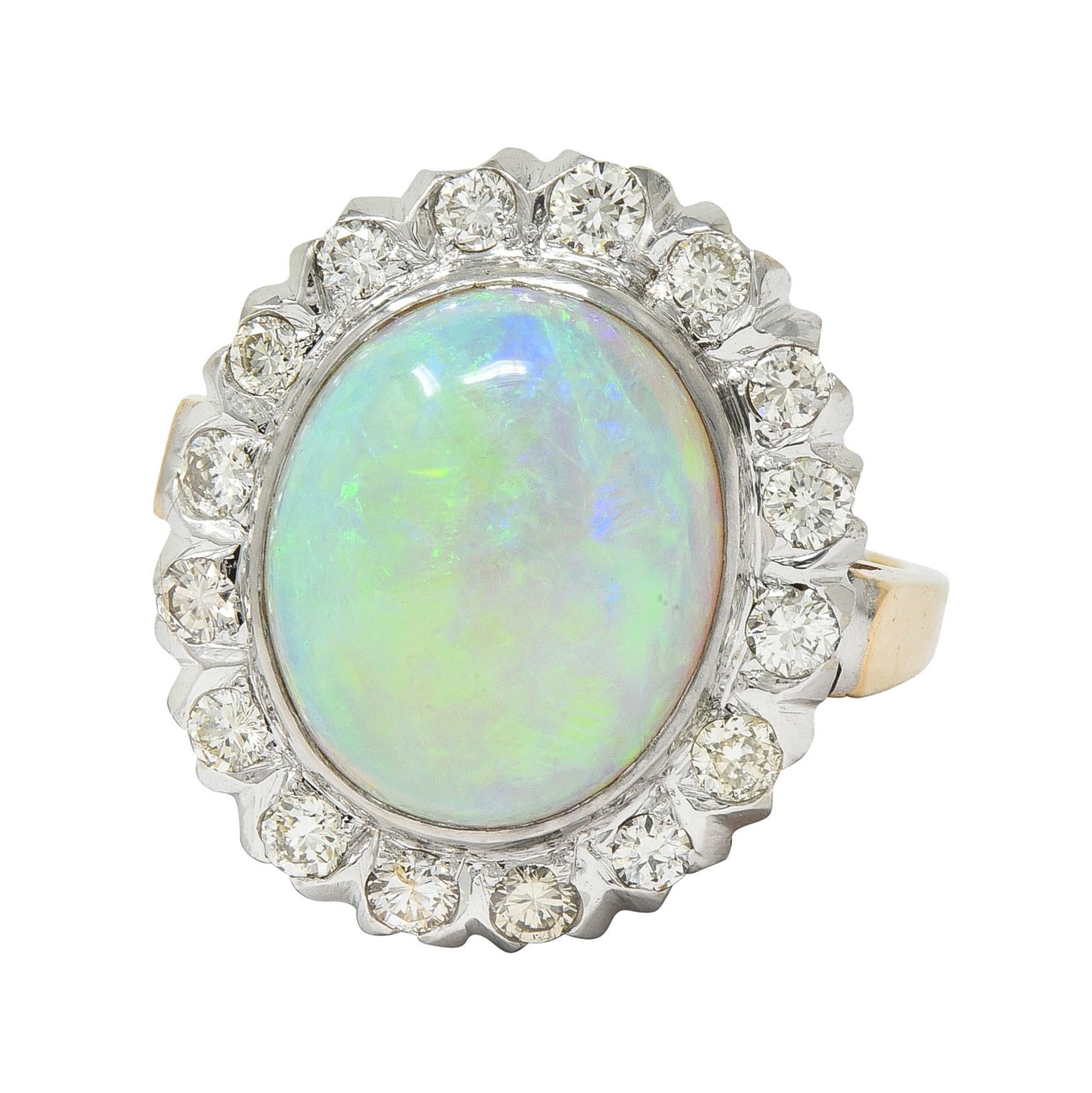 1940's Opal Diamond 14 Karat Two-Tone Gold Vintage Halo Ring