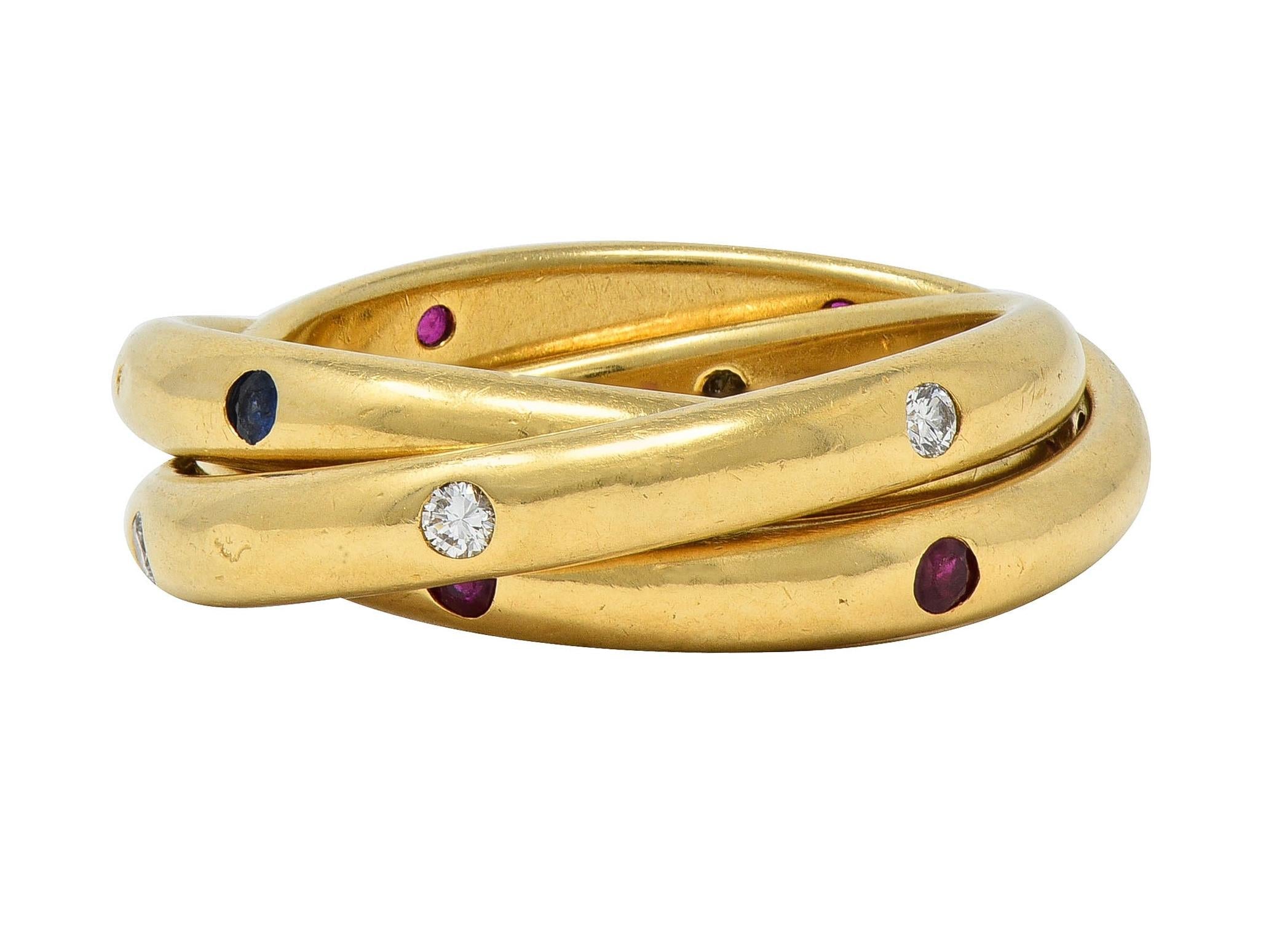 Cartier 1995 French Diamond Sapphire Ruby 18K Gold Vintage Rolling Band Ring