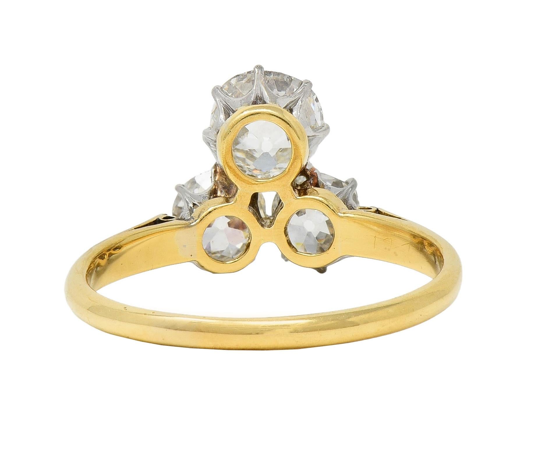 Edwardian 2.55 CTW Mine Diamond Platinum 18 Karat Gold Antique Three Stone Ring