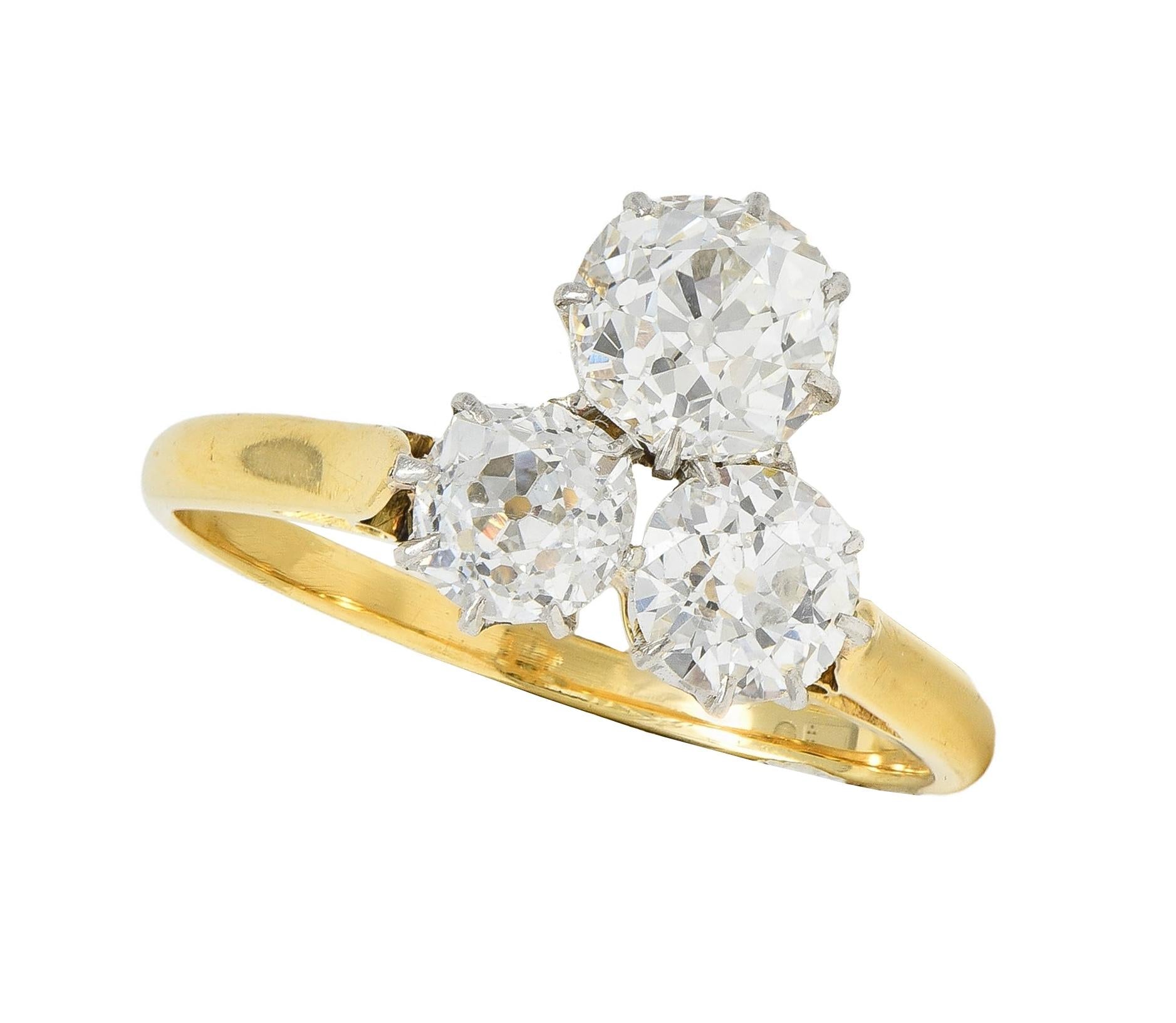 Edwardian 2.55 CTW Mine Diamond Platinum 18 Karat Gold Antique Three Stone Ring