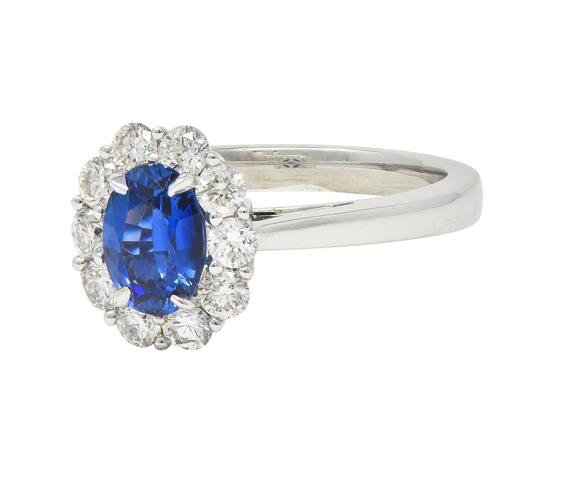 Contemporary 1.63 CTW Sapphire Diamond 18 Karat White Gold Halo Ring