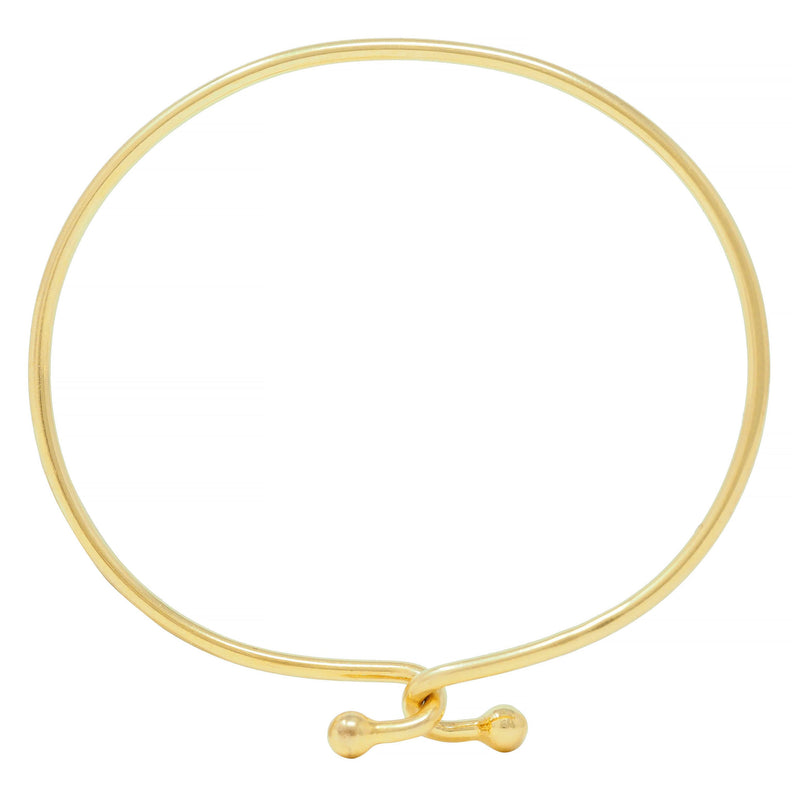 Tiffany & Co. 2000's 18 Karat Yellow Gold Interlocking Hook Bangle Bracelet