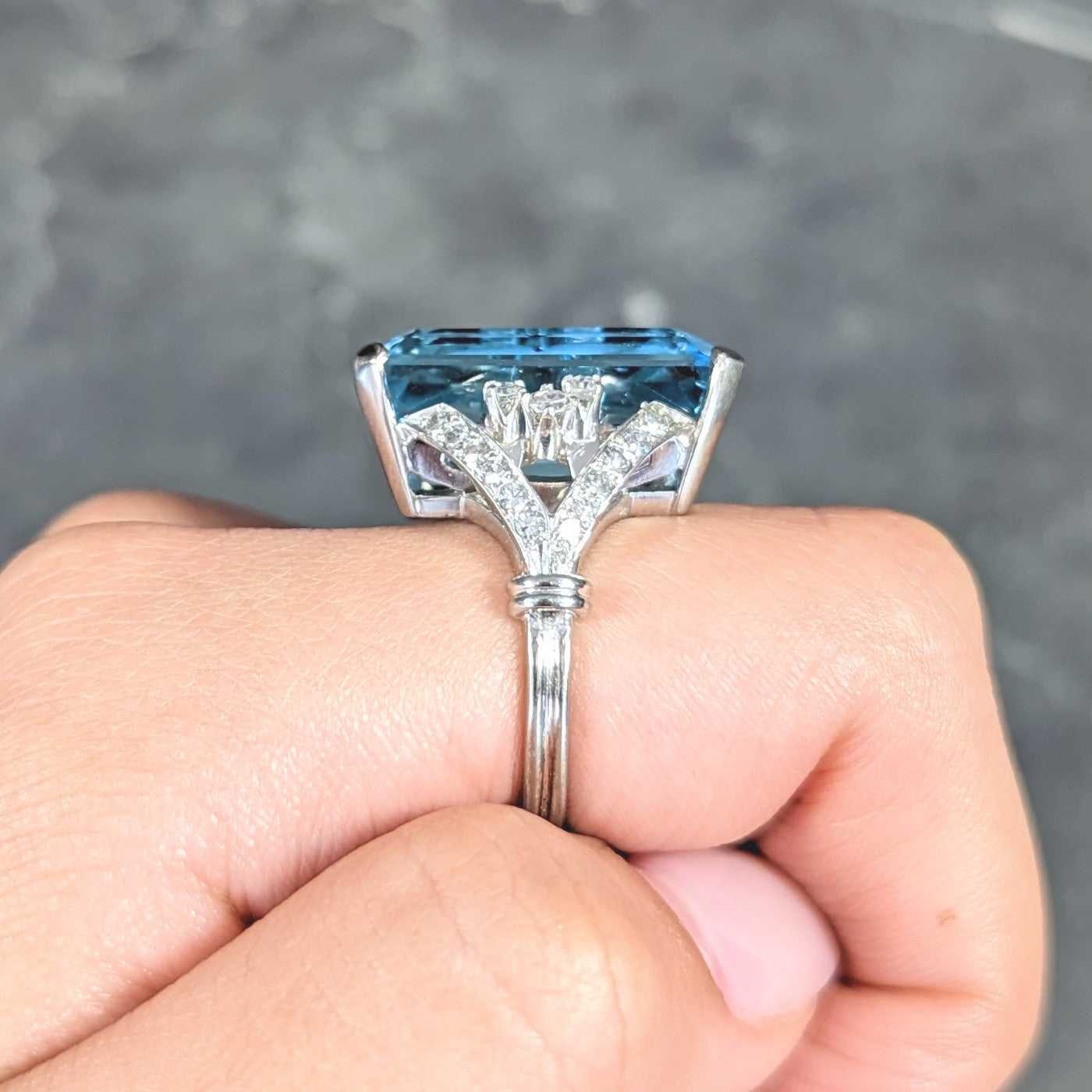 Mid-Century 21.00 CTW Emerald Cut Aquamarine Diamond 18 Karat White Gold Arching Vintage Cocktail Ring Wilson's Estate Jewelry