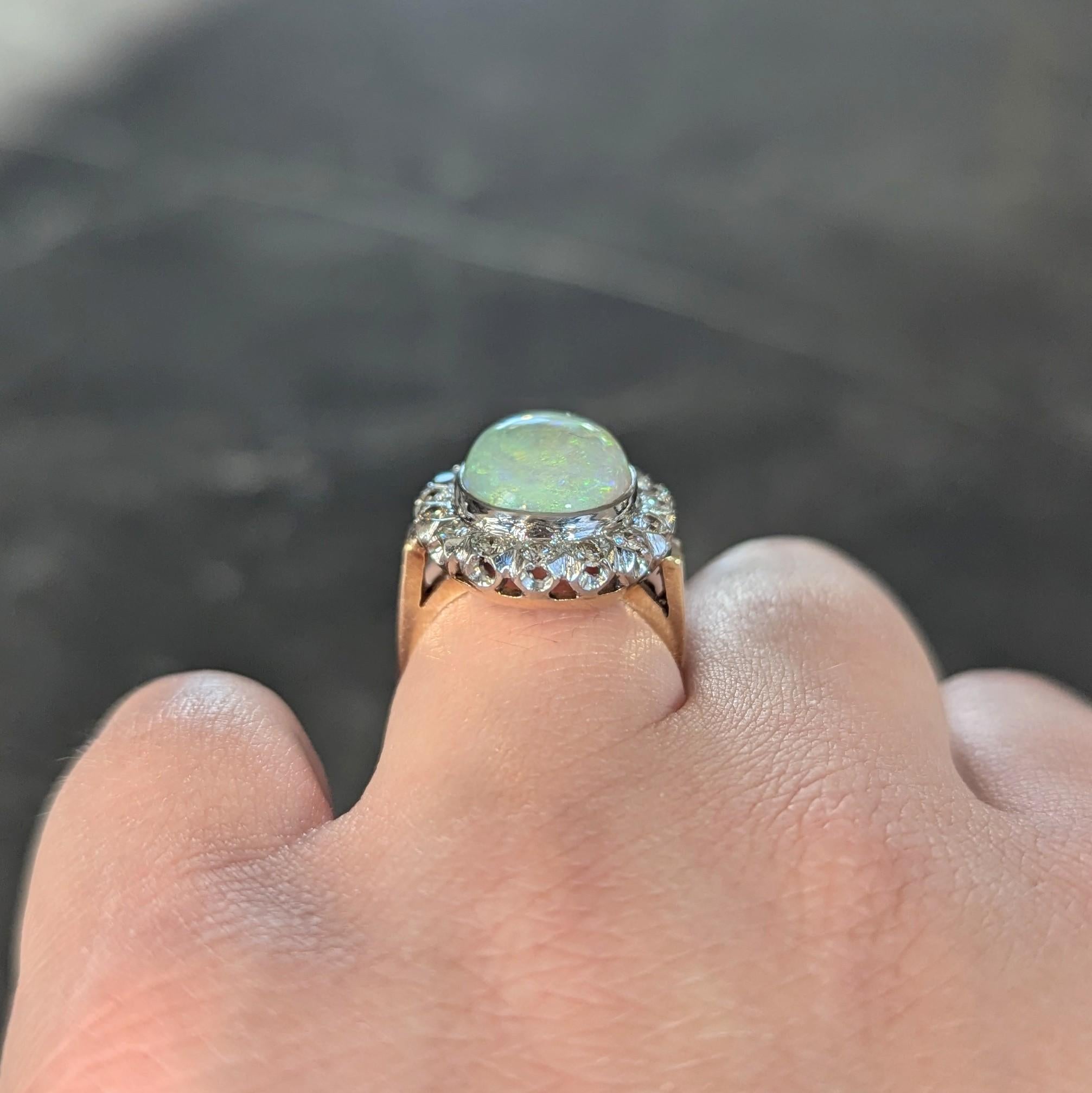 1940's Opal Diamond 14 Karat Two-Tone Gold Vintage Halo Ring