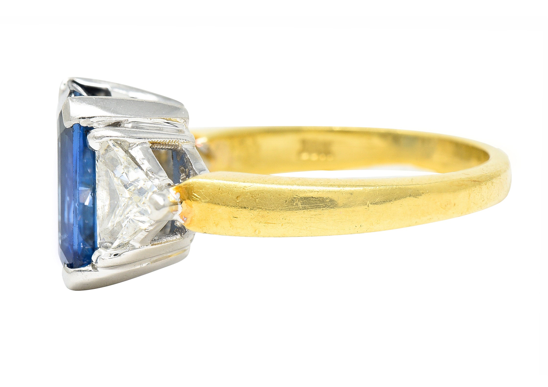 .11111 ## IS THIS A BETTER EDIT?SL 1980's 4.00 CTW Emerald Cut Sapphire Trillion Cut Diamond Platinum 18 Karat Yellow Gold Vintage Three Stone Ring Wilson's Estate Jewelry