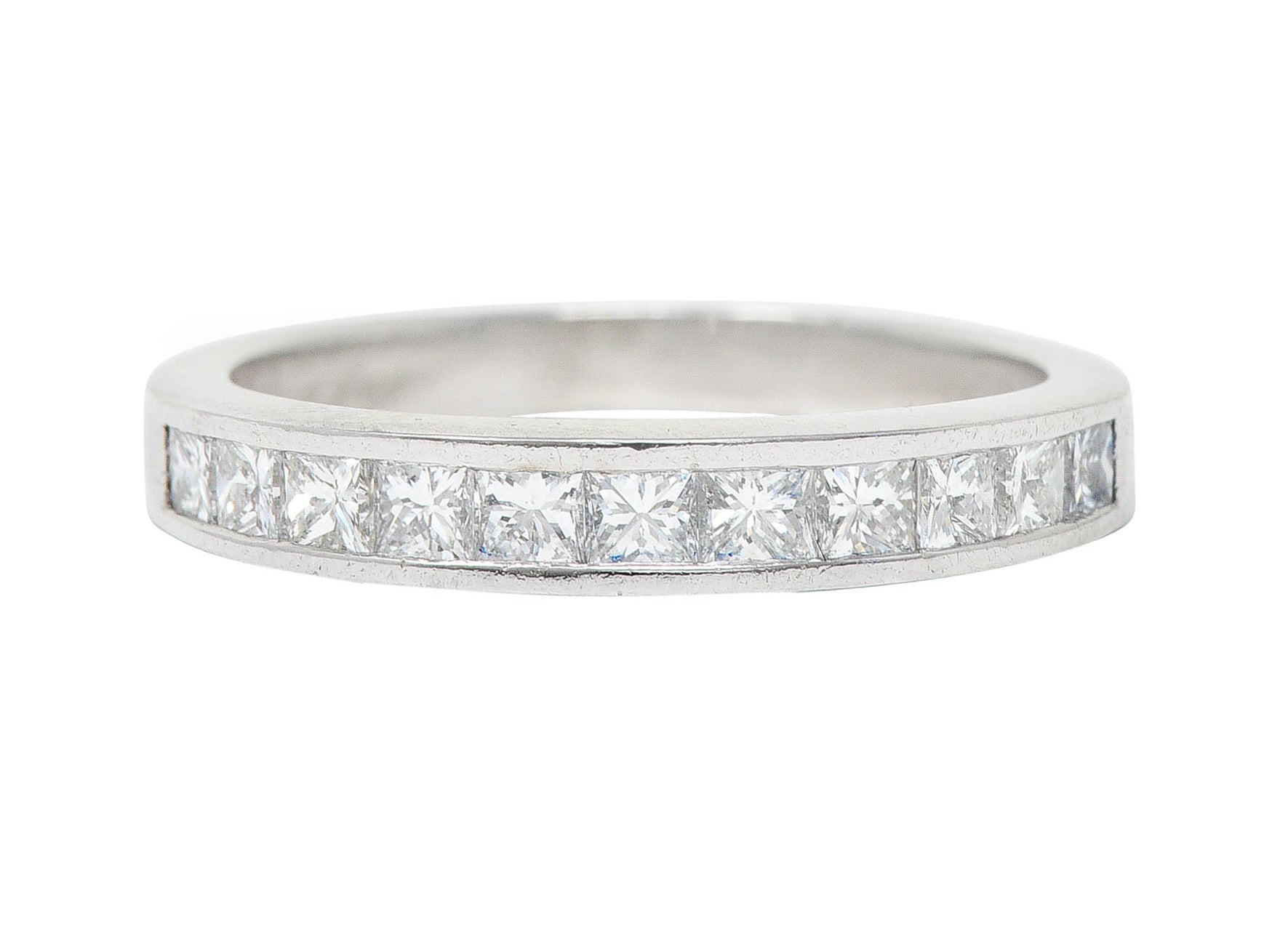 Contemporary 0.55 CTW Princess Diamond Platinum Channel Band RingRing - Wilson's Estate Jewelry