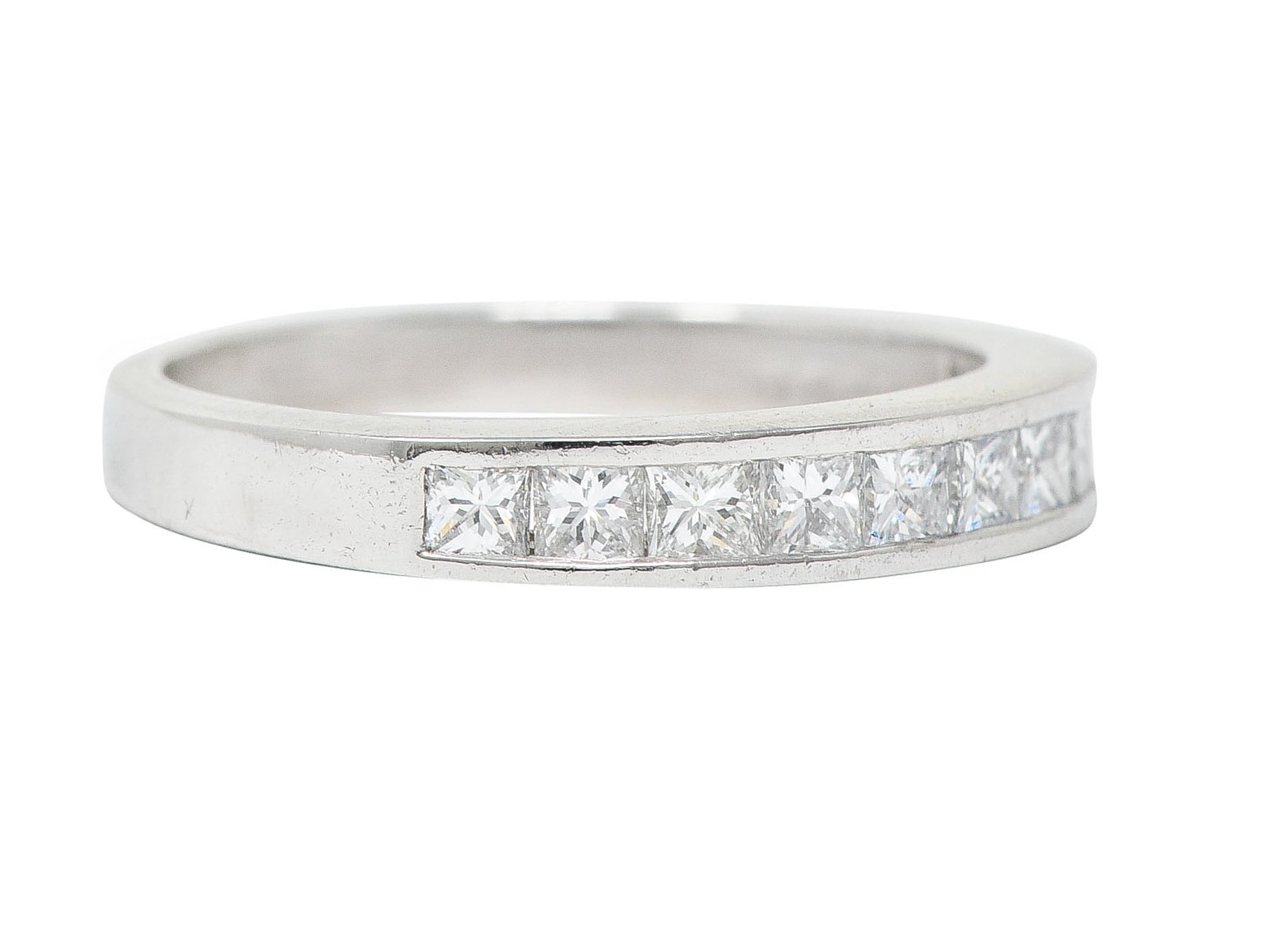 Contemporary 0.55 CTW Princess Diamond Platinum Channel Band RingRing - Wilson's Estate Jewelry