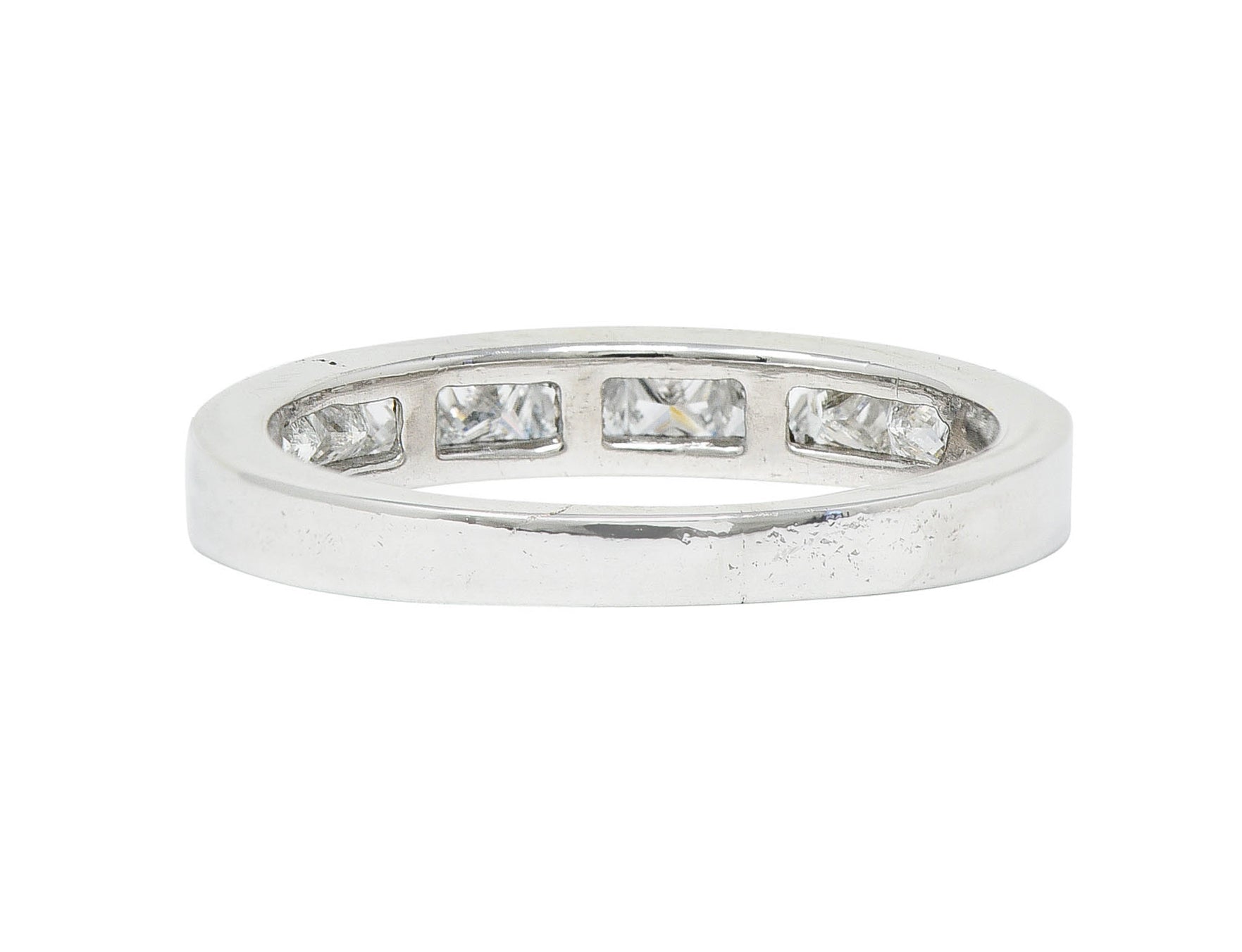 Contemporary 0.55 CTW Princess Diamond Platinum Channel Band RingRing - Wilson's Estate Jewelry