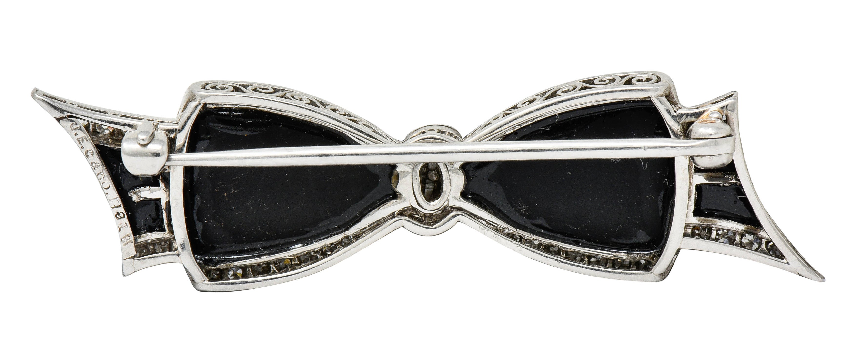 J.E. Caldwell Art Deco Diamond Onyx Platinum Bow Brooch - Wilson's Estate Jewelry