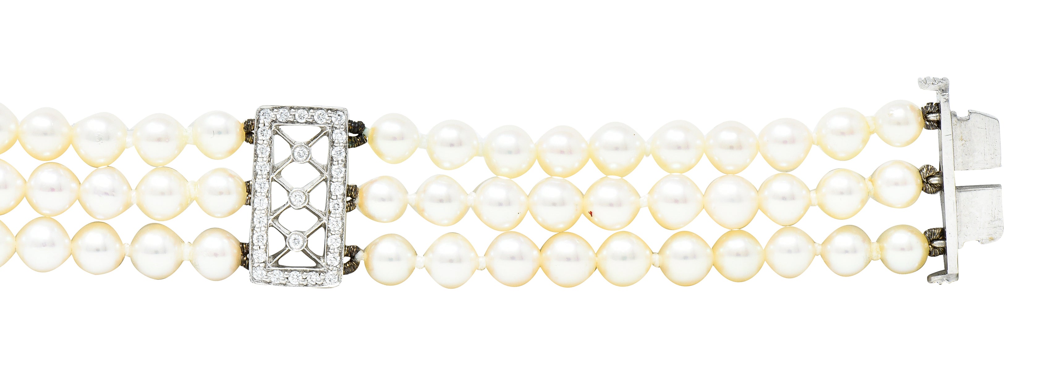 Tiffany & Co. Diamond Pearl Platinum Voile Three Strand Station Bracelet Wilson's Estate Jewelry