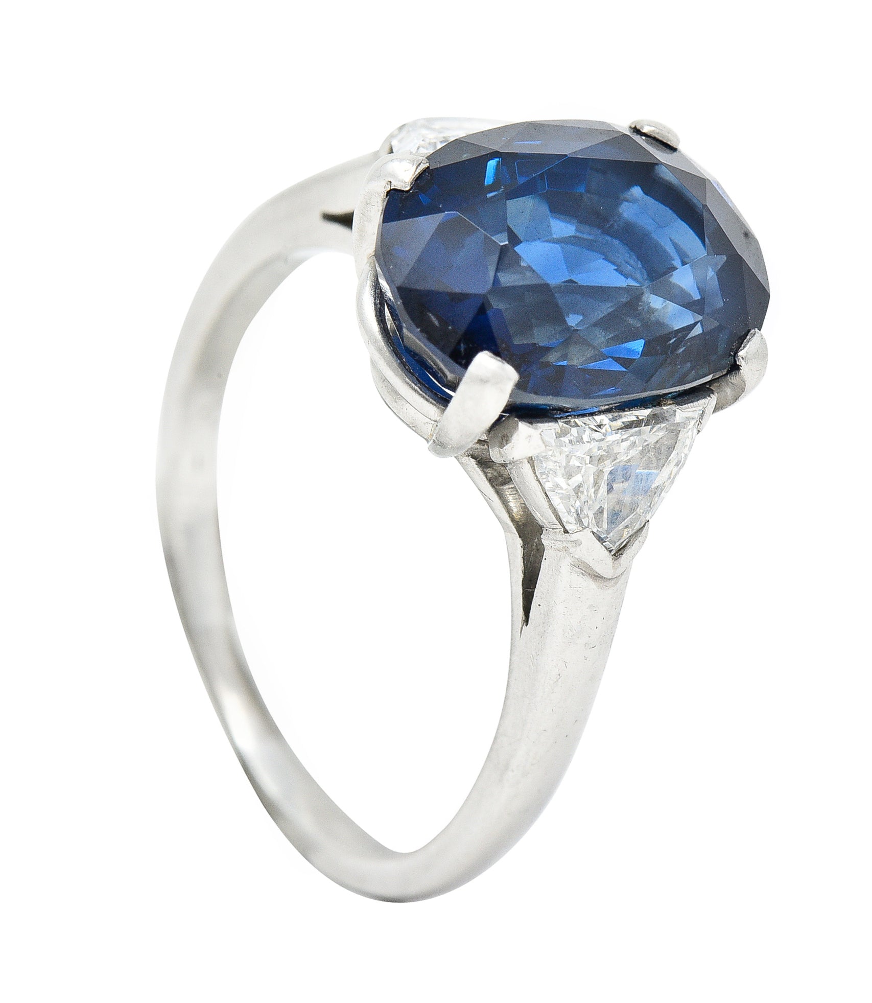 Mid-Century 7.13 CTW Oval Cut No-Heat Thai Sapphire Trillion Cut Diamond Platinum Vintage Three Stone Ring GIA Wilson's Estate Jewelry