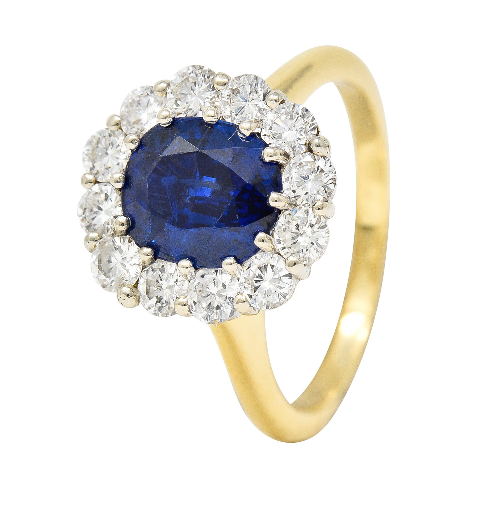 Vintage 3.25 CTW Cushion Cut Sapphire Diamond 18 Karat Two-Tone Vintage Halo Ring GIA Wilson's Estate Jewelry