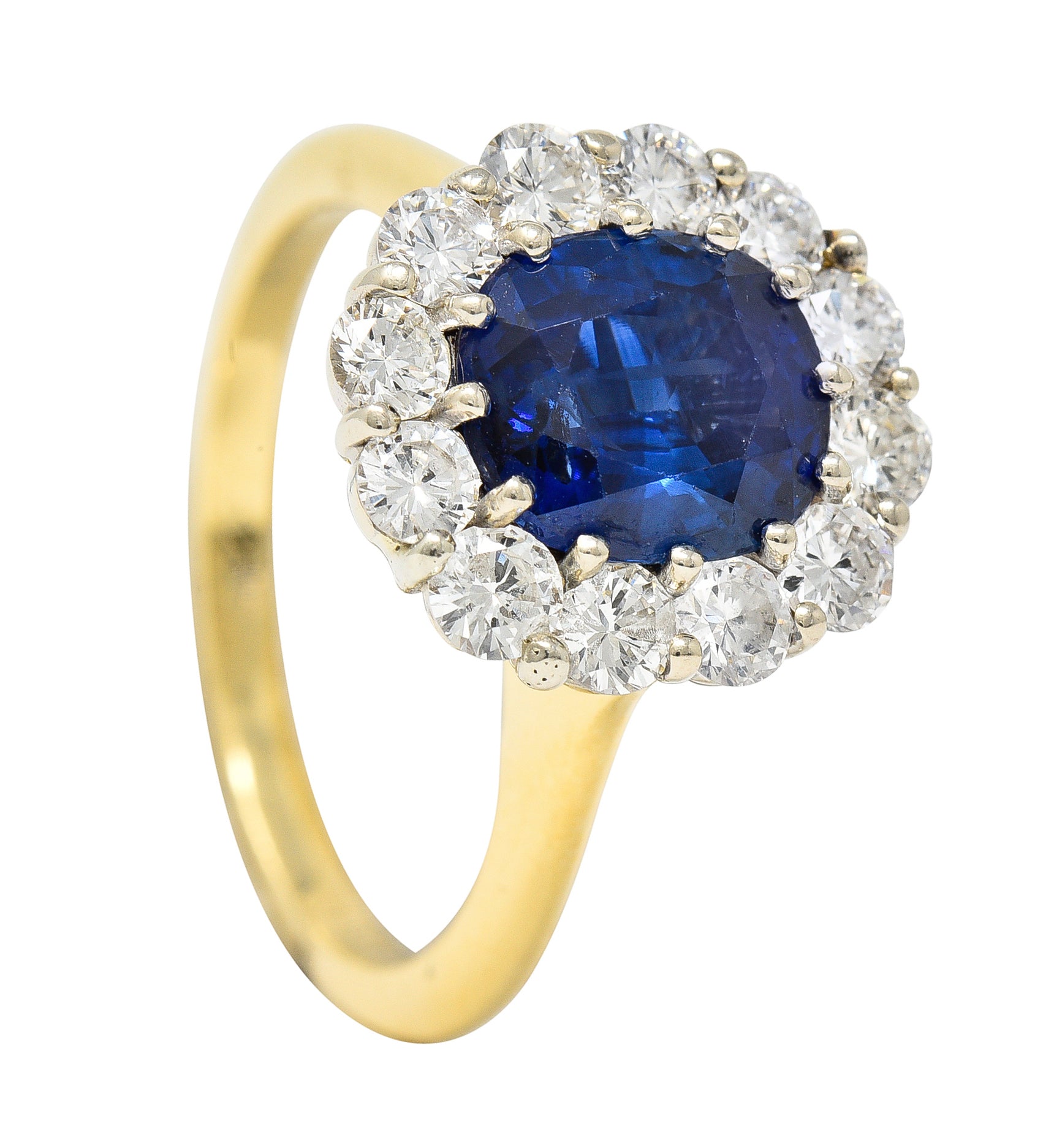 Vintage 3.25 CTW Cushion Cut Sapphire Diamond 18 Karat Two-Tone Vintage Halo Ring GIA Wilson's Estate Jewelry