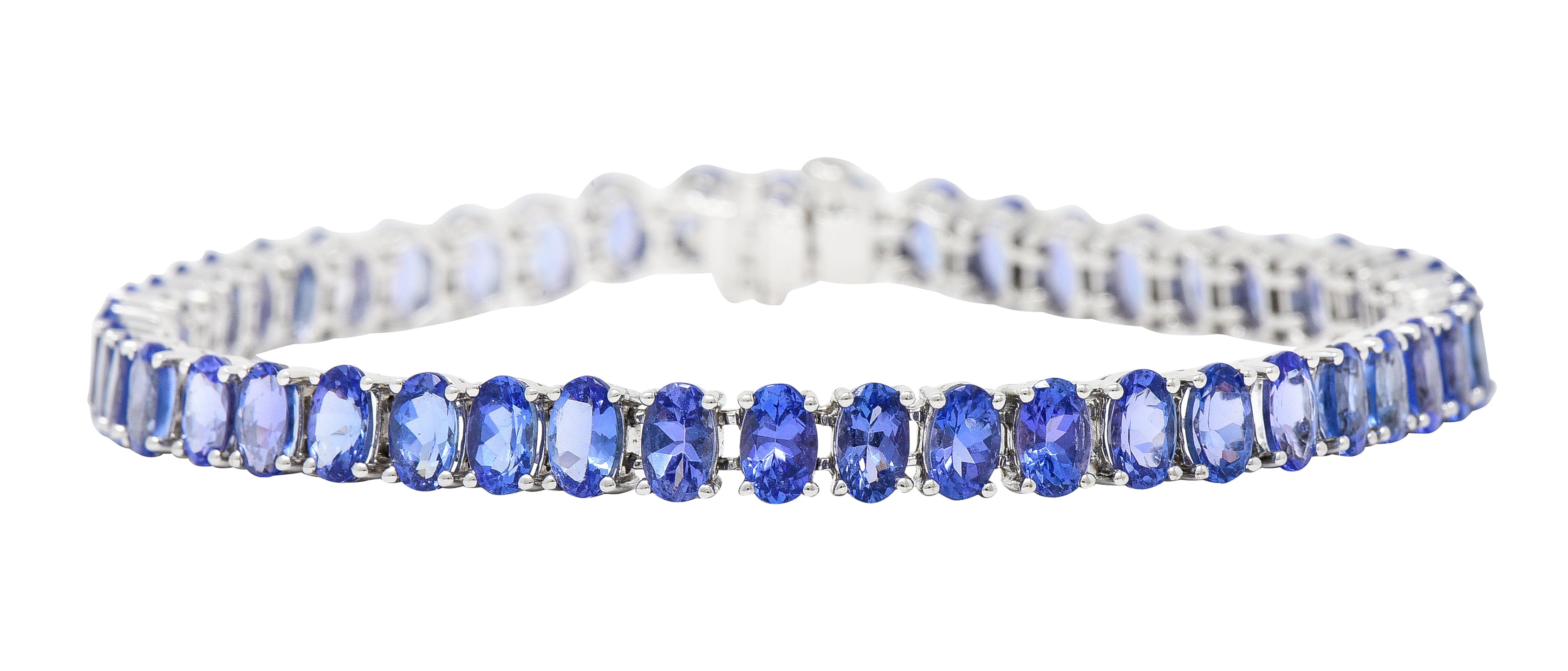 Contemporary 12.00 CTW Oval Cut Tanzanite 14 Karat White Gold Line Bracelet Wilson's Estate Jewelry