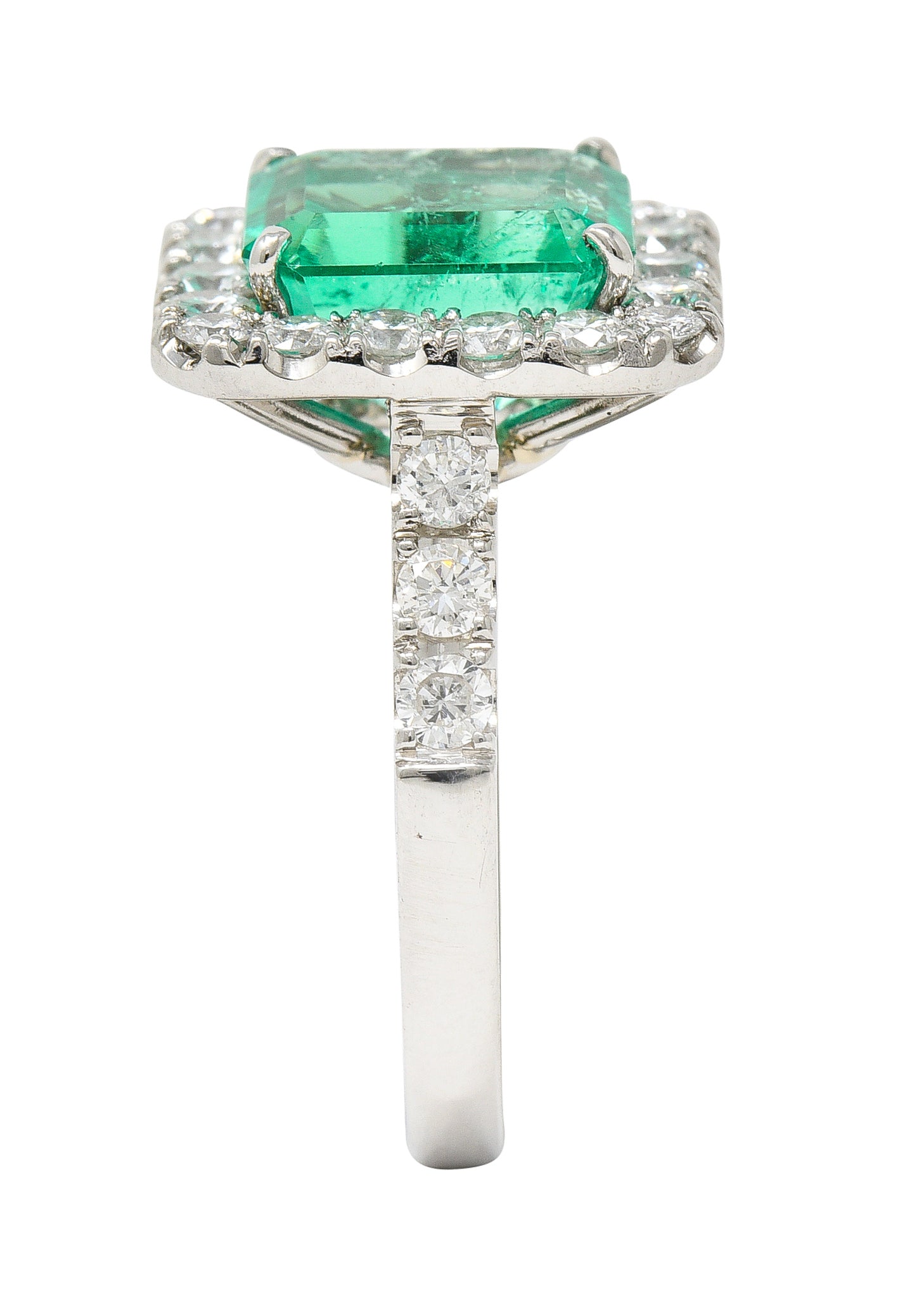 Contemporary 3.50 CTW Colombian Emerald Diamond Platinum Halo Ring GIA Wilson's Estate Jewelry