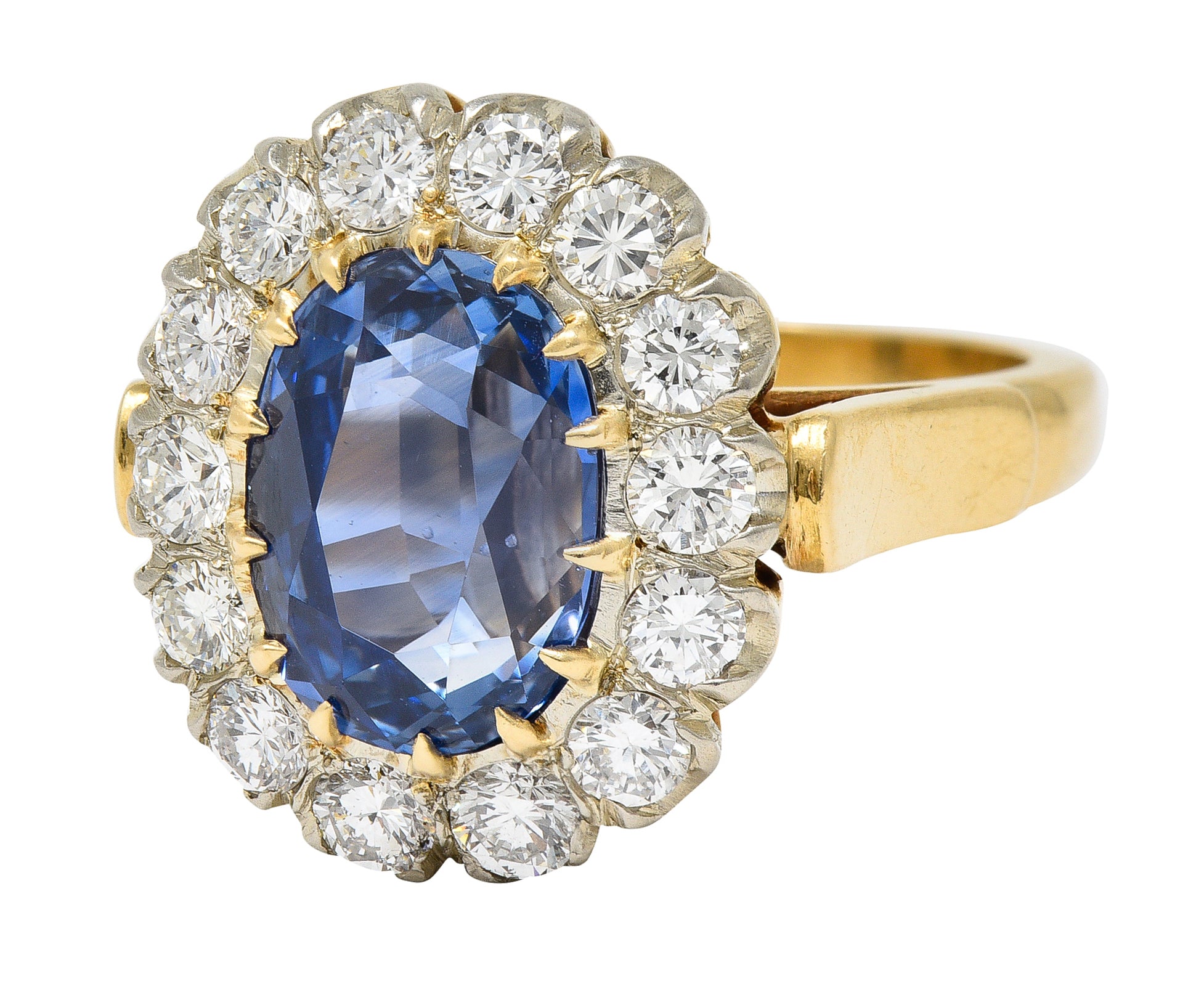 1960's 6.03 CTW Oval Cut Ceylon Sapphire Diamond Platinum-Topped 14 Karat Yellow Gold Vintage Halo Ring GIA Wilson's Estate Jewelry