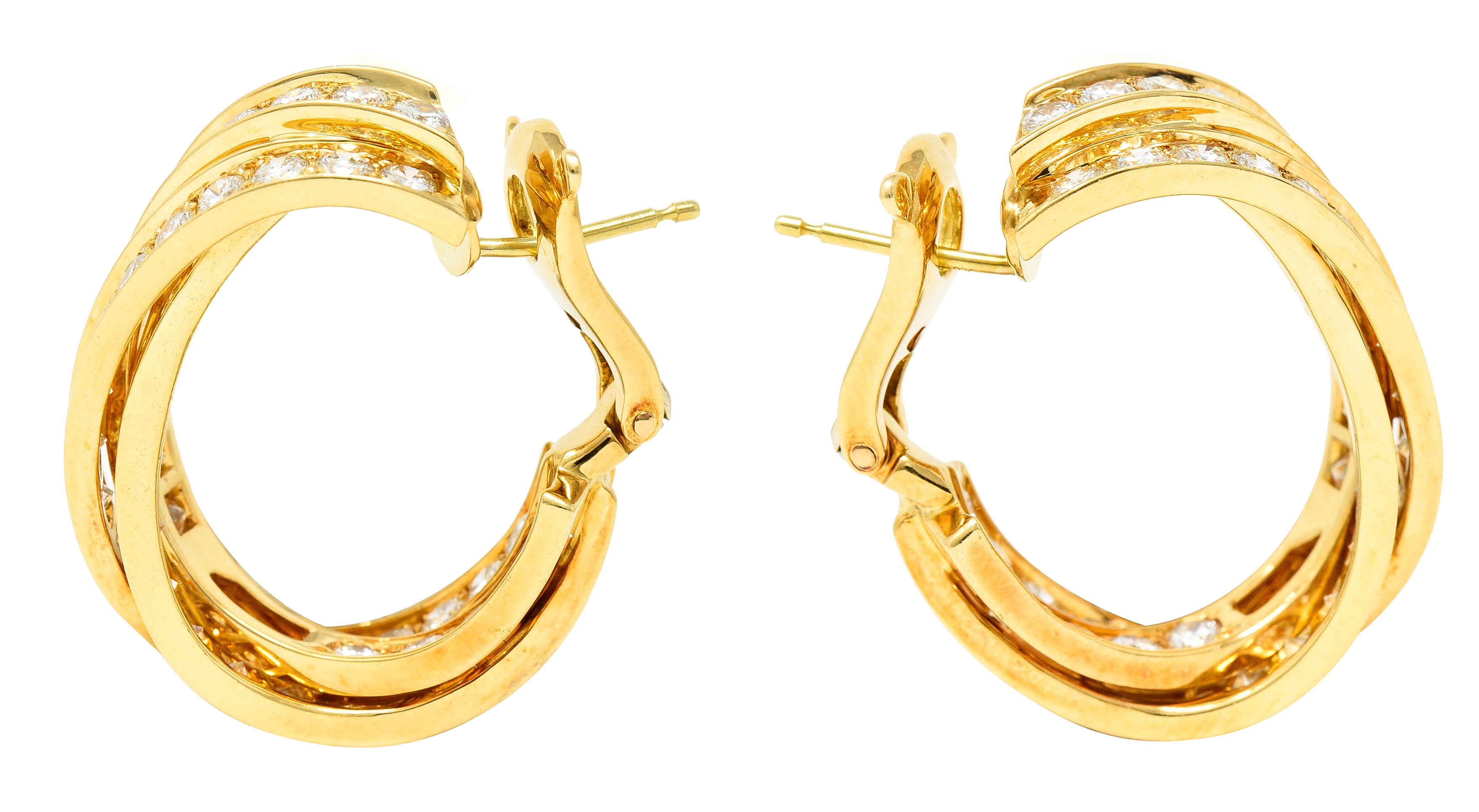 Cartier French 1990's 6.15 CTW Diamond 18 Karat Yellow Gold Twisting Trinity Inside/Outside J-Hoop Vintage Earrings Wilson's Estate Jewelry