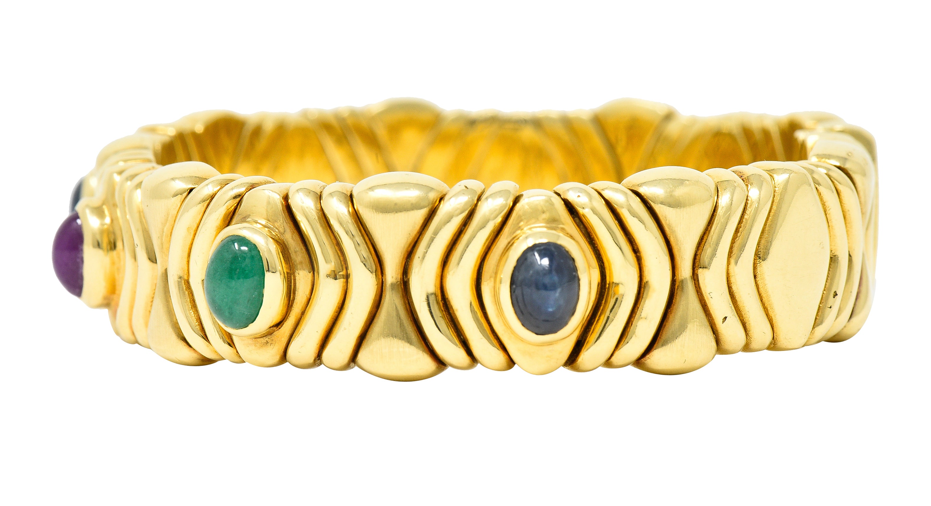 Bulgari 1980's Ruby Sapphire Emerald Cabochon 18 Karat Yellow Gold Tubogas Parentesi Vintage Cuff Bracelet Wilson's Estate Jewelry