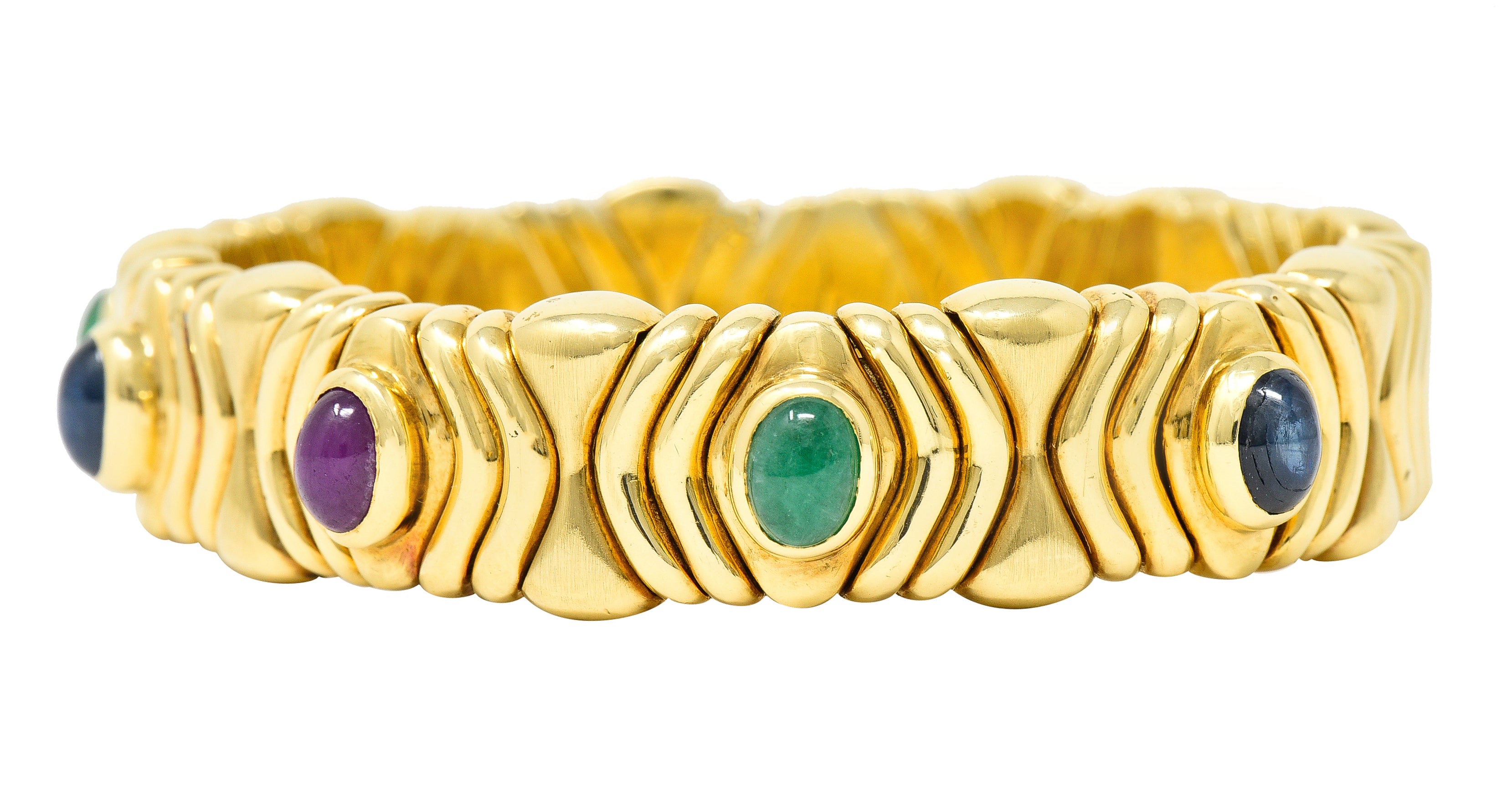 Bulgari 1980's Ruby Sapphire Emerald Cabochon 18 Karat Yellow Gold Tubogas Parentesi Vintage Cuff Bracelet Wilson's Estate Jewelry