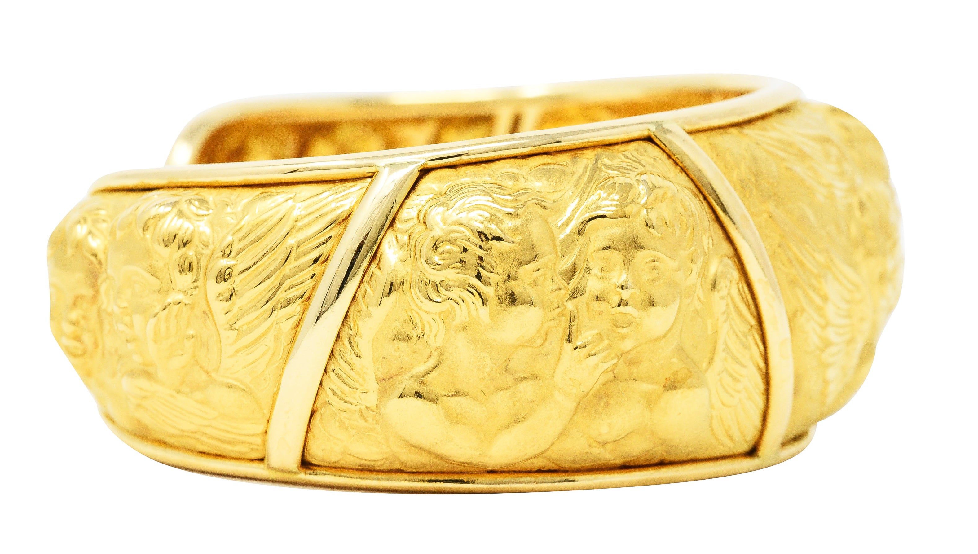 Carrera y Carrera 1990's 18 Karat Yellow Gold Repoussé Cherub Vintage Cuff Bracelet Wilson's Estate Jewelry