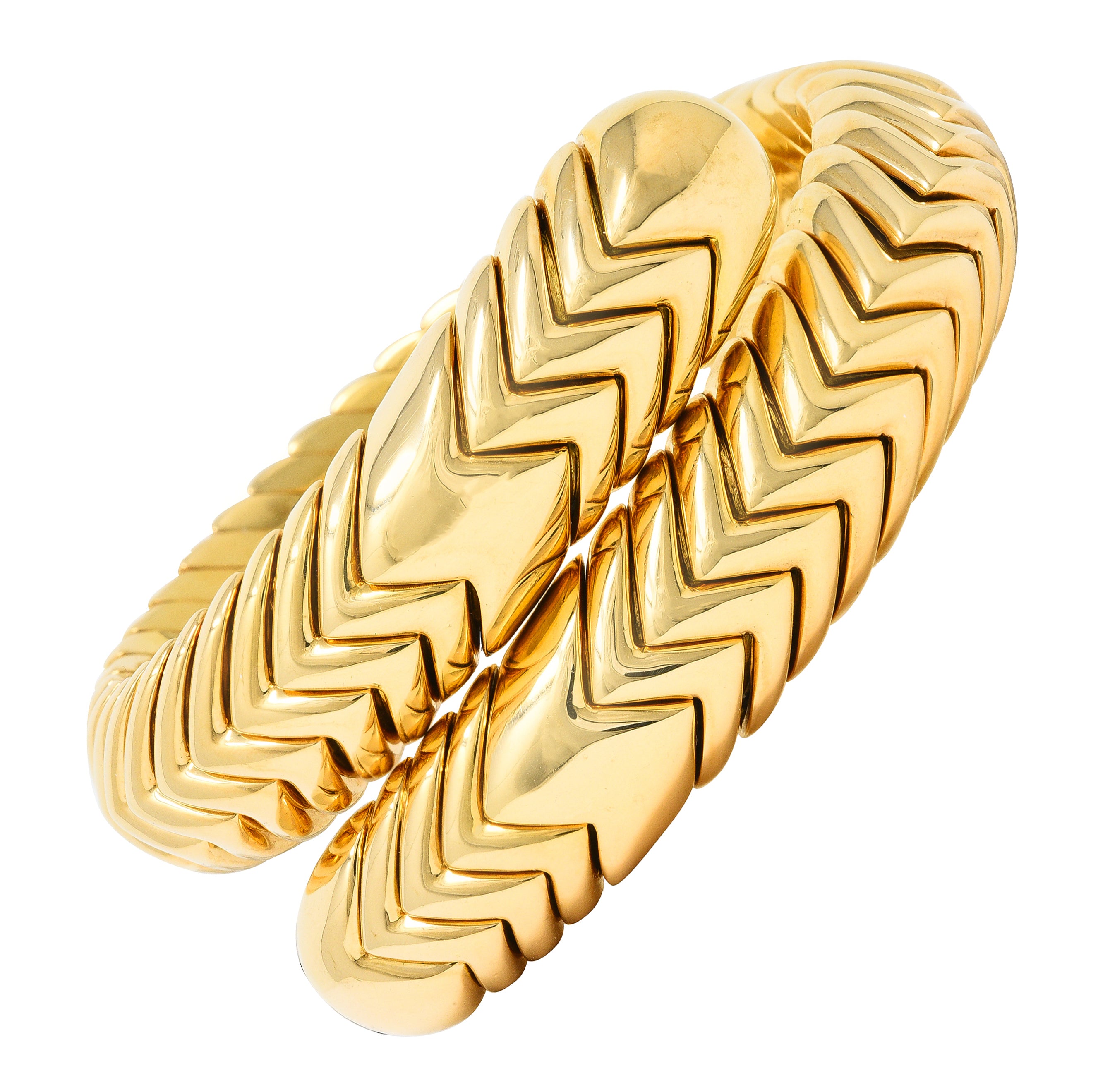 Bulgari 1990's 18 Karat Yellow Gold Chevron Spiga Wrap Vintage Bangle Bracelet Wilson's Estate Jewelry