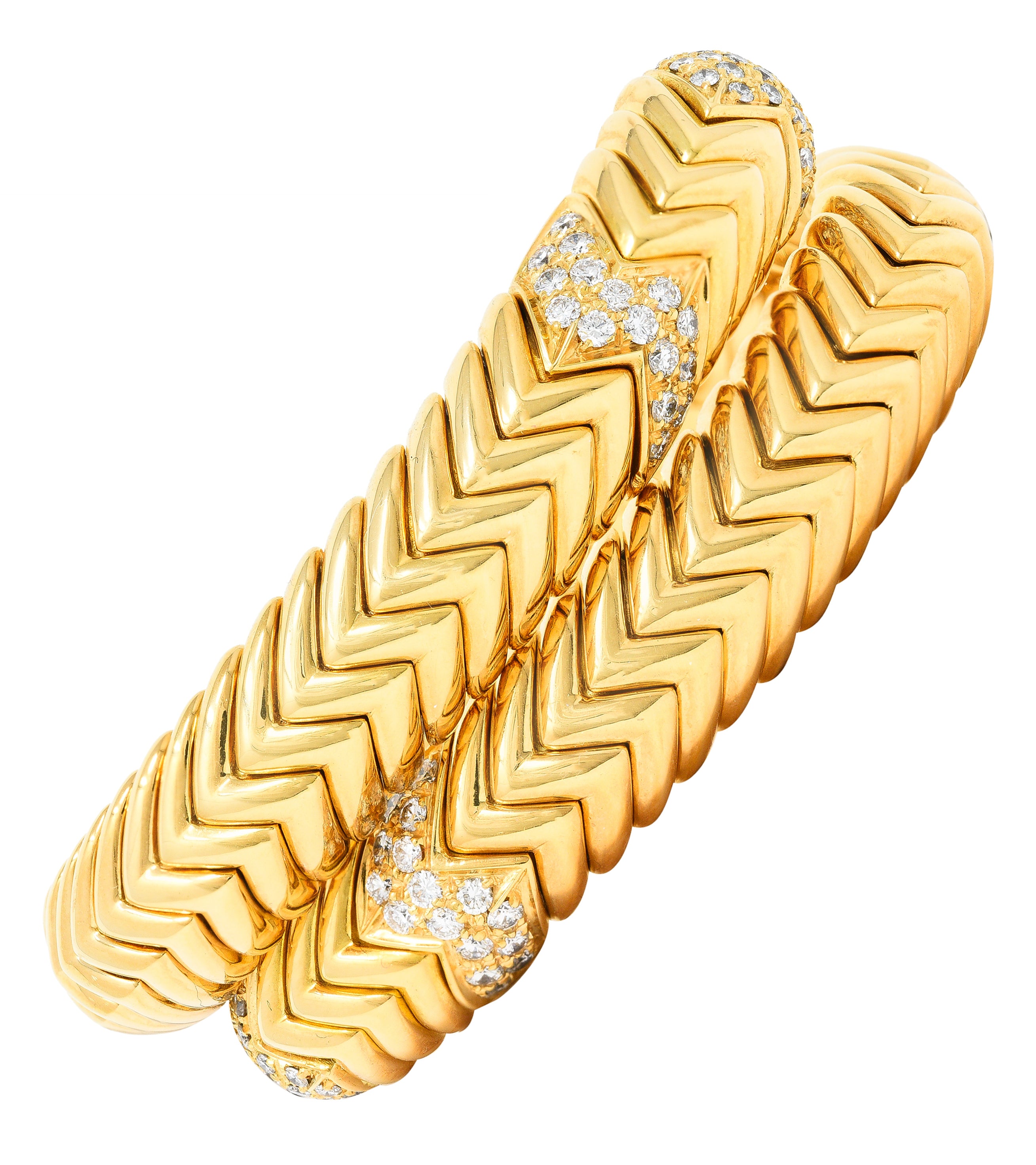 Bulgari 1990's Diamond 18 Karat Yellow Gold Chevron Spiga Wrap Vintage Bangle Bracelet Wilson's Estate Jewelry