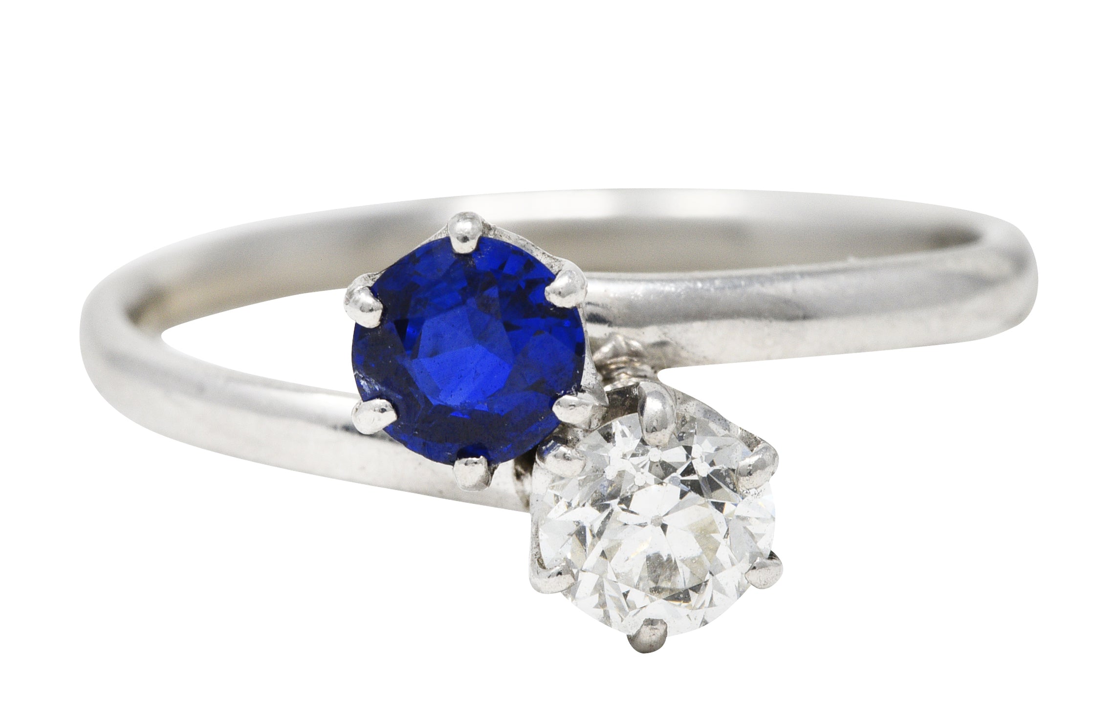 Tiffany & Co. Edwardian 0.79 CTW Sapphire Diamond Platinum Toi Et Moi Antique Bypass Ring Wilson's Estate Jewelry