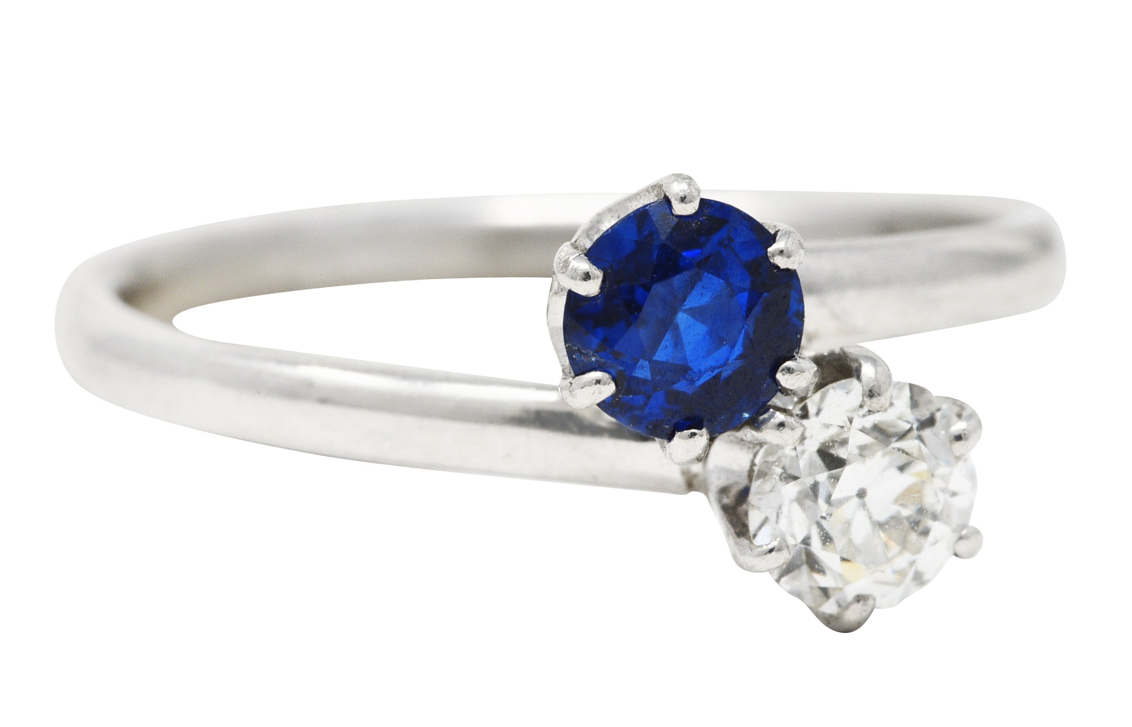 Tiffany & Co. Edwardian 0.79 CTW Sapphire Diamond Platinum Toi Et Moi Antique Bypass Ring Wilson's Estate Jewelry