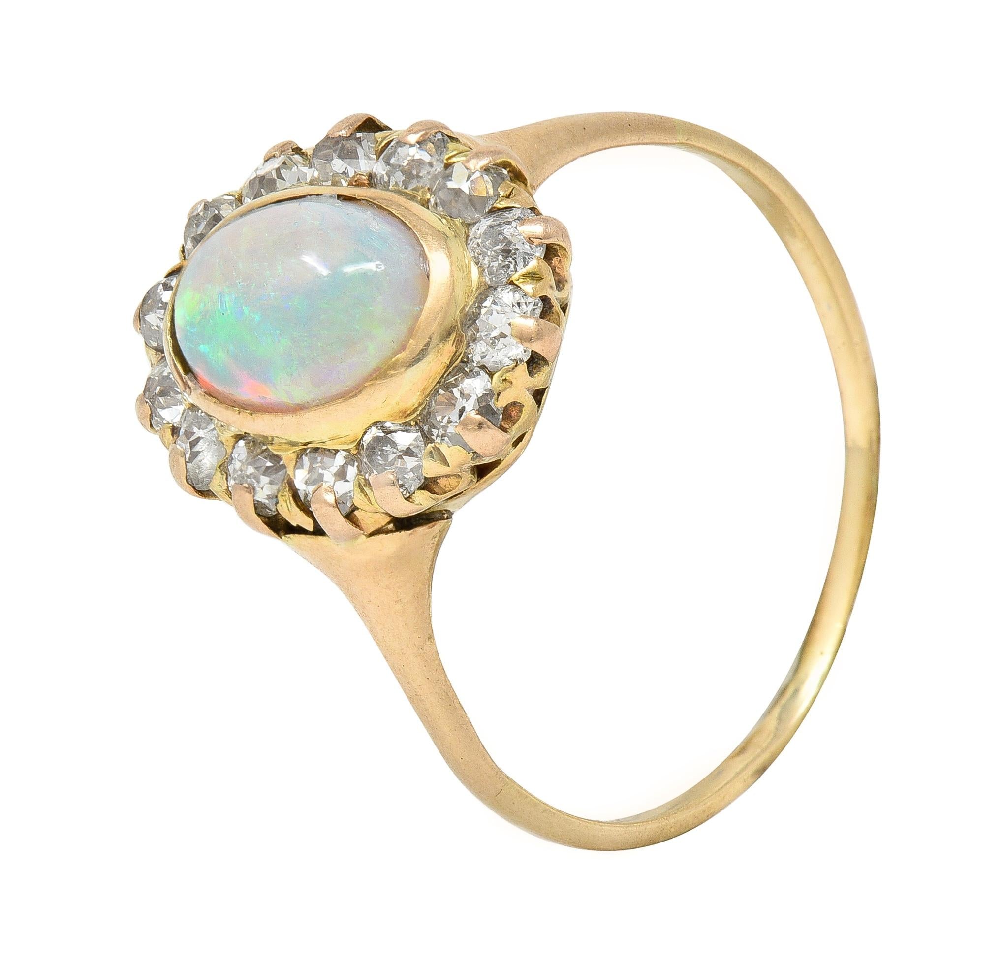 Victorian 0.86 CTW Opal Cabochon Diamond 14 Karat Yellow Gold Antique Halo Ring