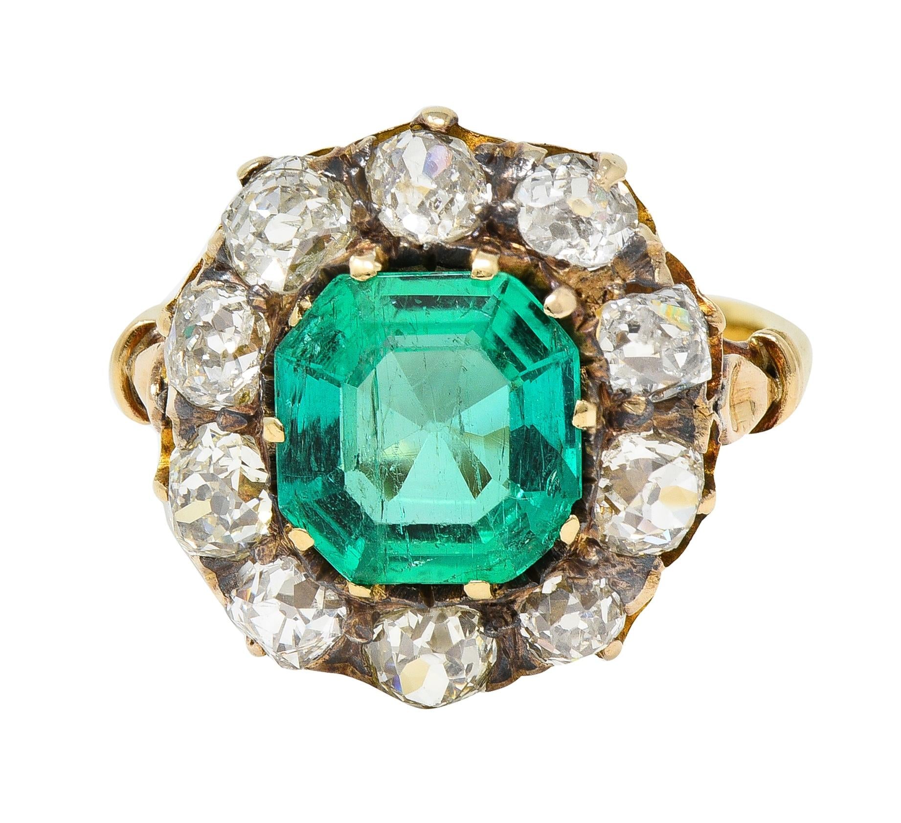 Victorian 4.28 CTW Colombian Emerald Diamond 18 Karat Yellow Gold Halo Ring GIA