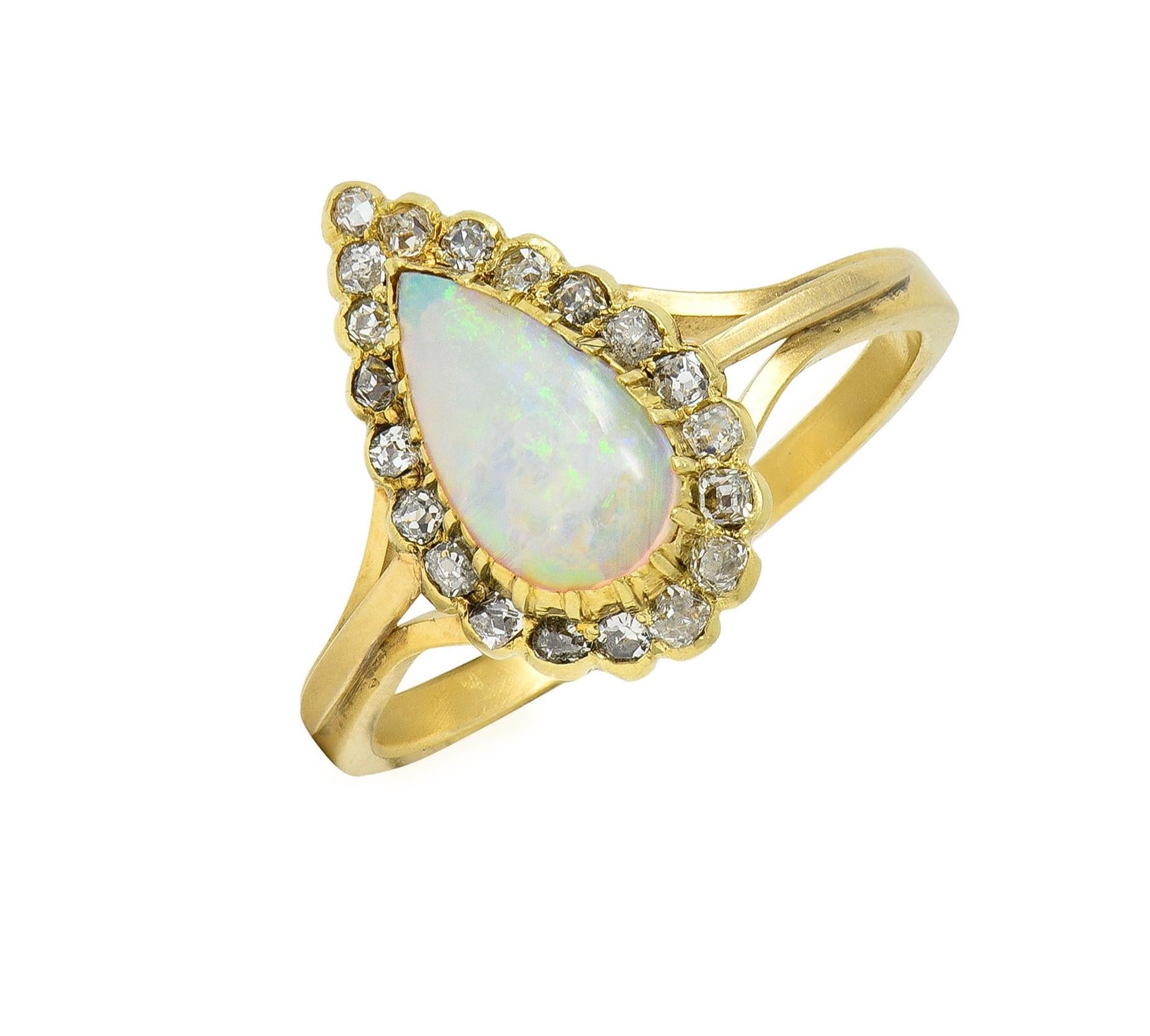 Victorian Opal Pear Cabochon Old Mine Diamond 18 Karat Yellow Gold Halo Ring