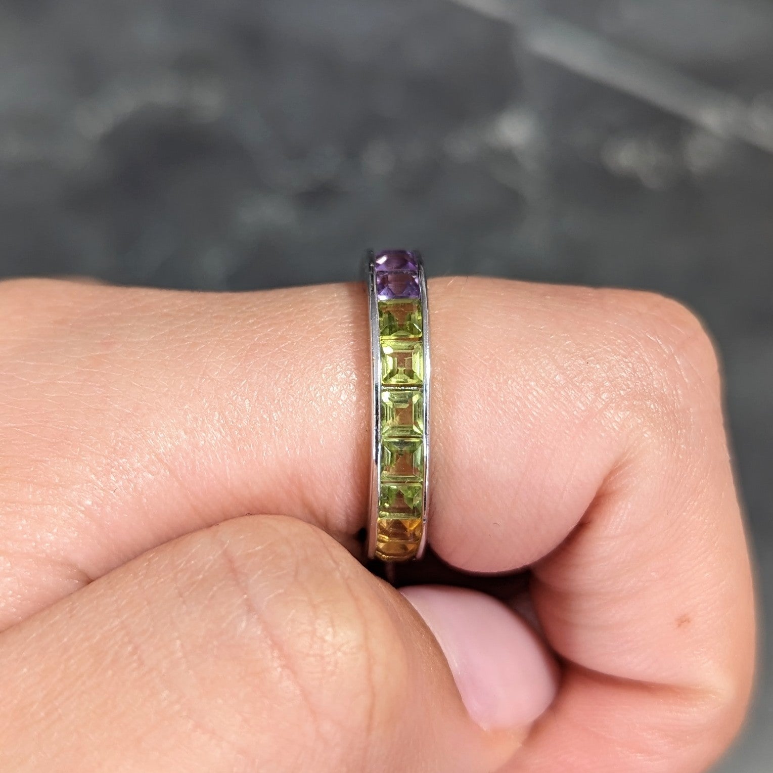 Modern Amethyst Peridot Citrine Garnet Square Cut 18 Karat White Gold Channel Rainbow Eternity Band Ring Wilson's Estate Jewelry