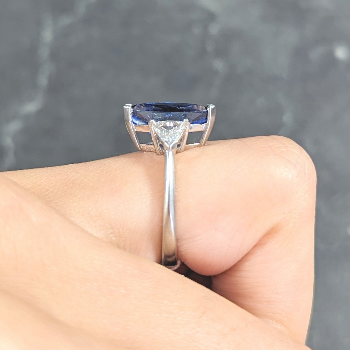 Contemporary 2.44 CTW Marquise Cut Sapphire Trillion Cut Diamond Platinum Three Stone Ring Wilson's Estate Jewelry