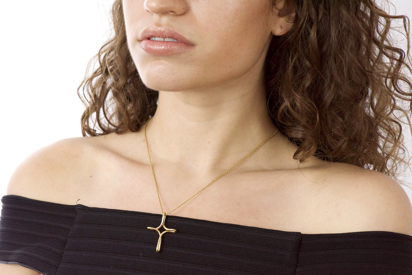 Elsa Peretti Tiffany & Co. 18 Karat Gold Infinity Cross Pendant Necklace Wilson's Estate Jewelry