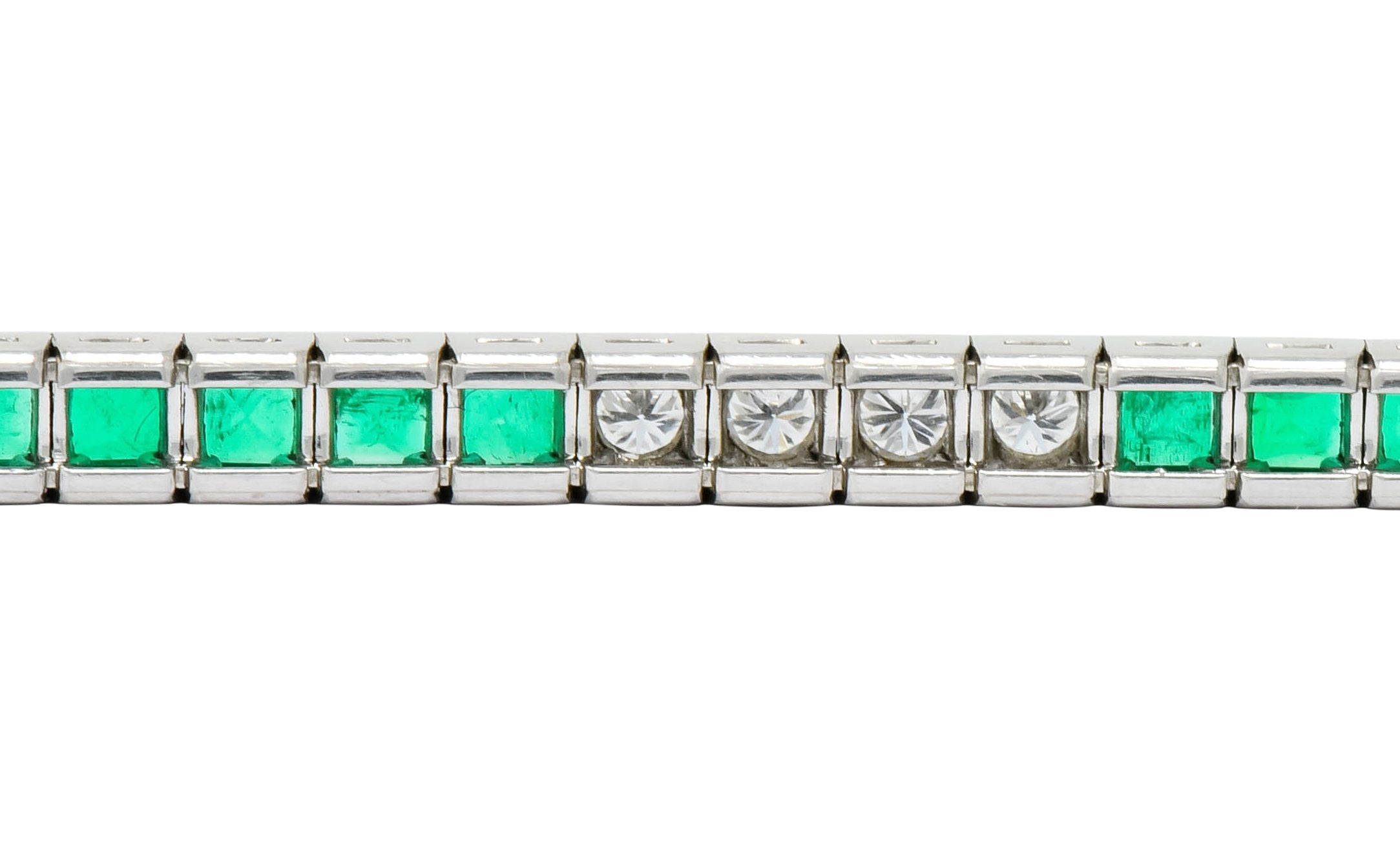 Mid-Century 6.06 CTW Diamond Emerald Platinum Tennis Line Bracelet - Wilson's Estate Jewelry